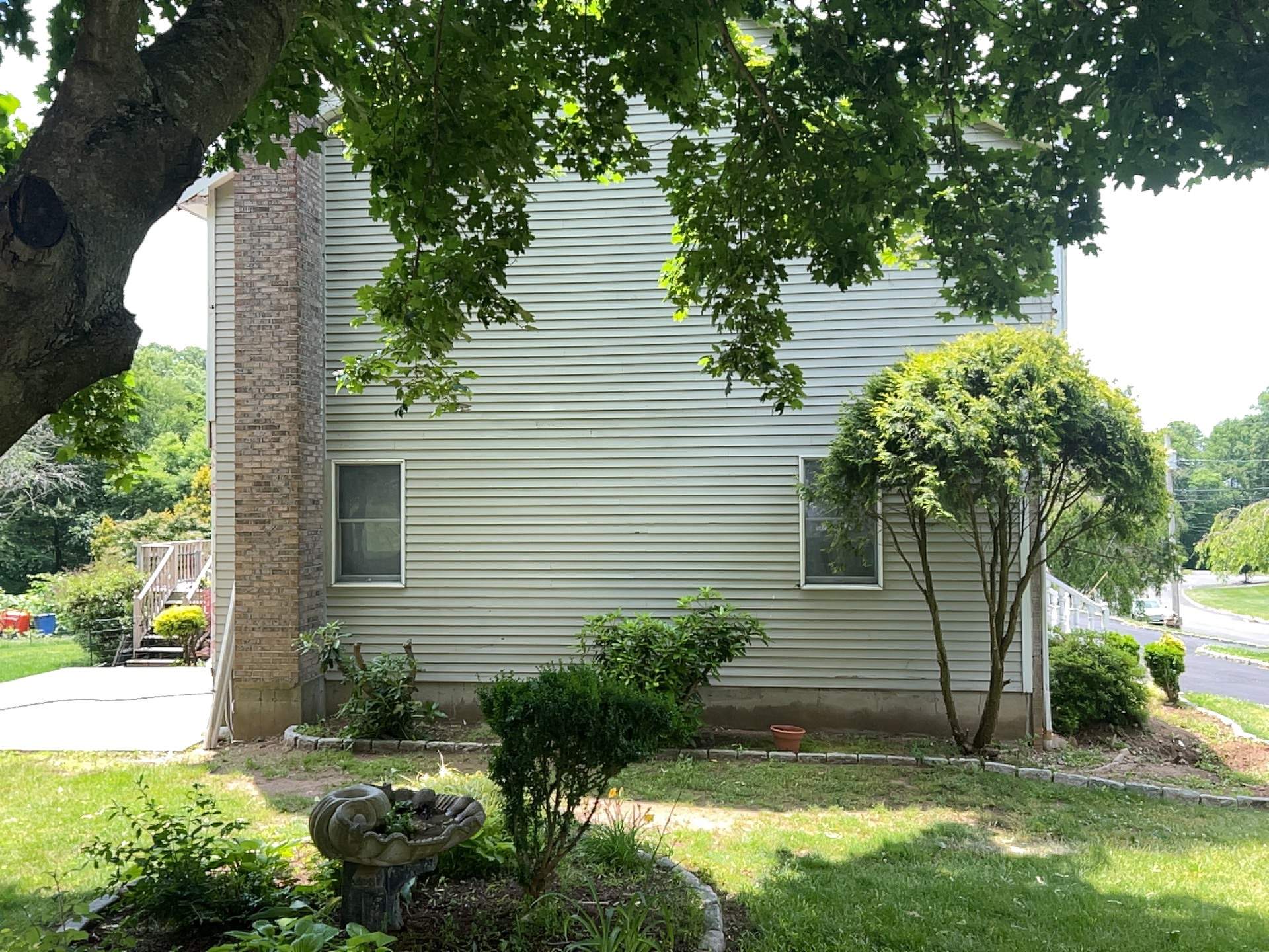 Siding Installation using Mainstreet Colonial & White gutters by A Plus Exterior