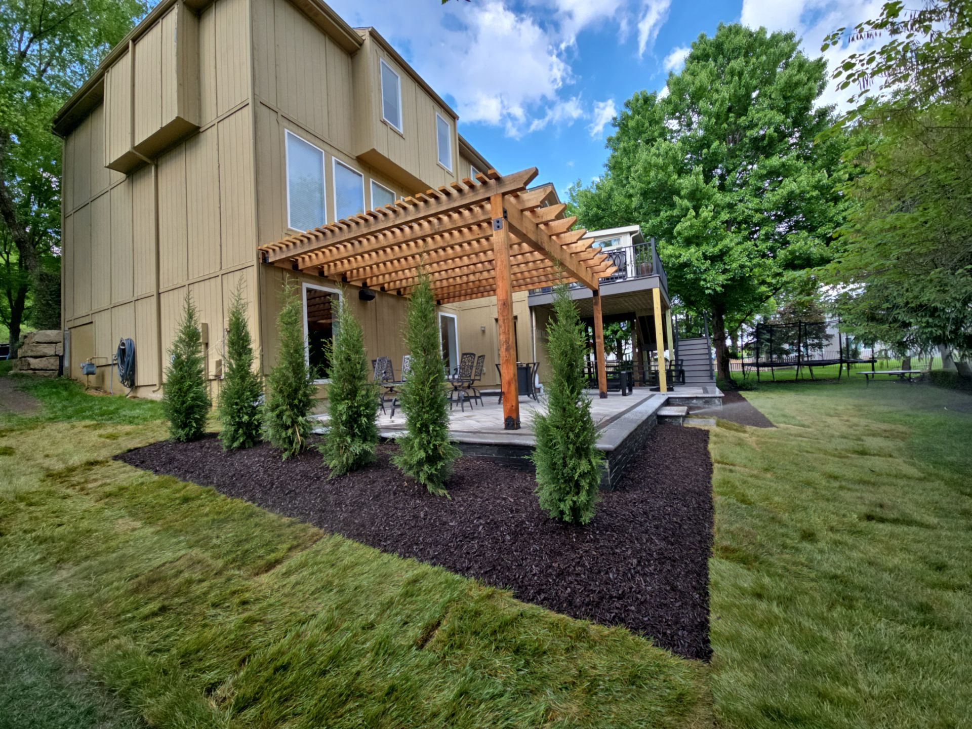 Back Yard Patio, Pergola, and Deck by LAND ESCAPES LLC