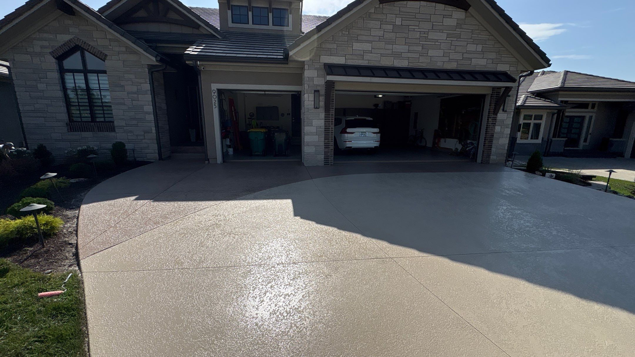 Two-Tone Driveway Resurface - Olathe, KS by Big Red Decorative Concrete, LLC