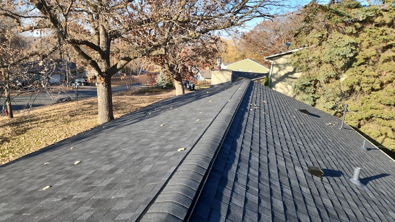 Owens Corning Duration – Onyx Black Roof & Gutter Replacement | Long Lake, MN by First Impressions Exteriors