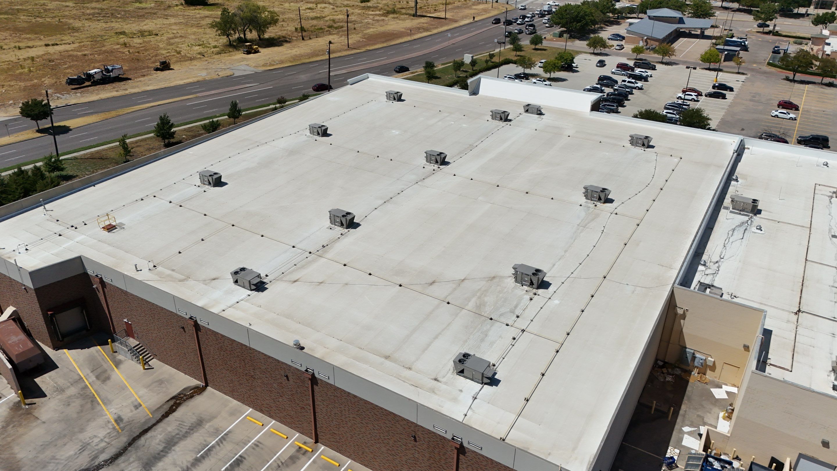 Commercial Flat Roof Repair and Safety Guardrail Installation in Plano by Armor Roofing | Exteriors