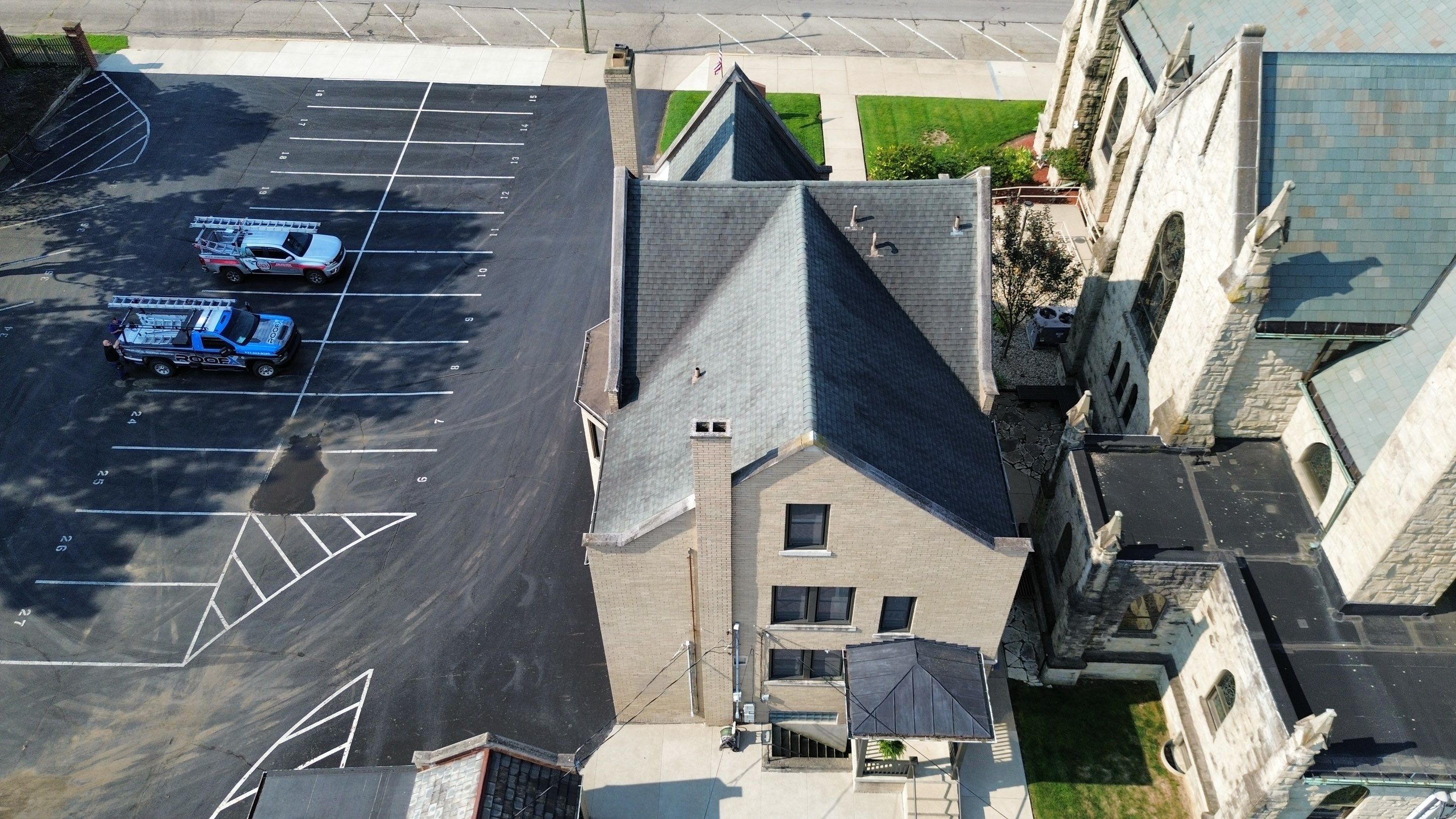 Commercial Roofing Installation using Standing Seam Metal - Frost Black by RoofX 