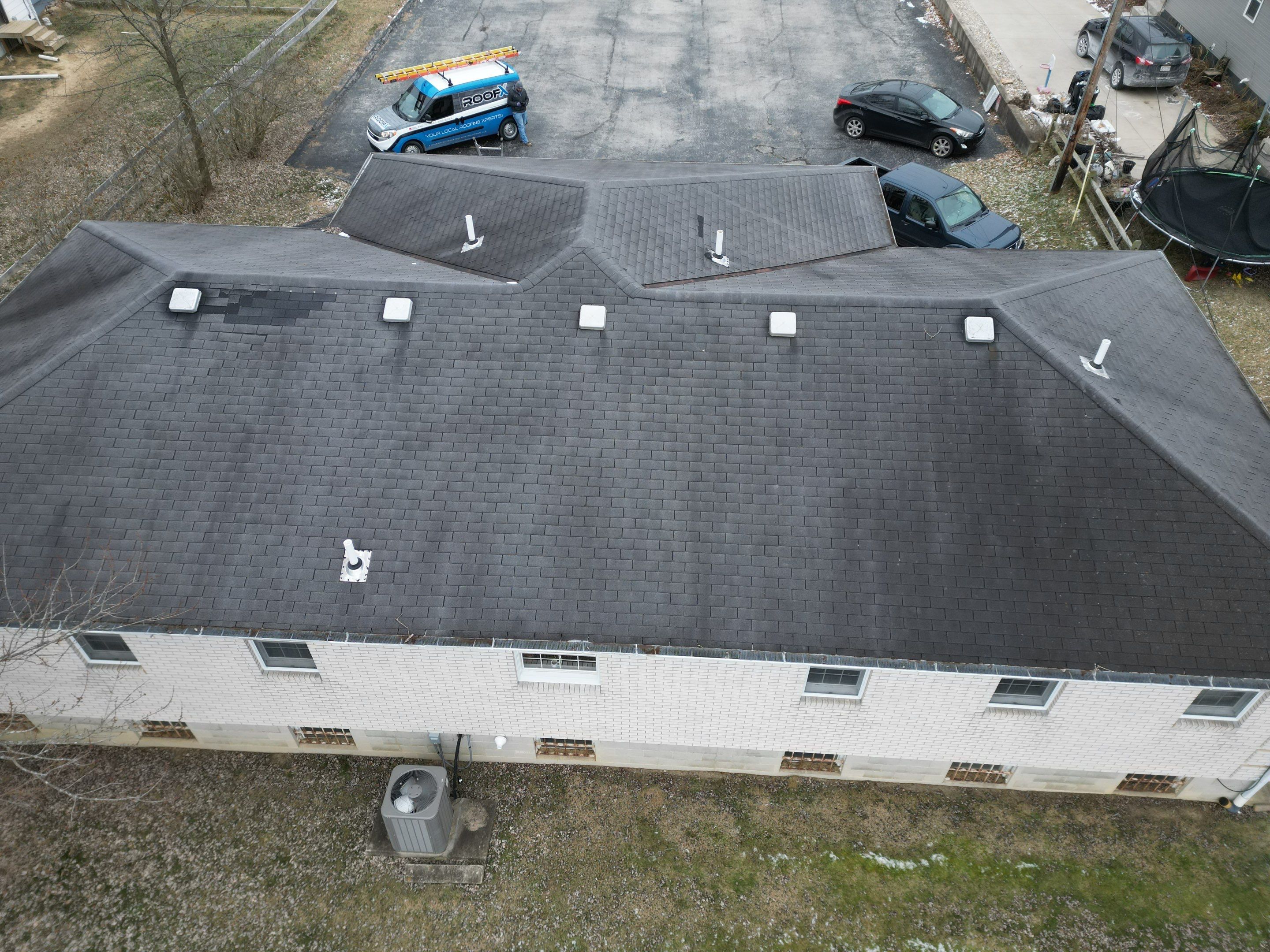 Commercial Roofing Installation using Performance Panel Metal - Frost Black by RoofX 