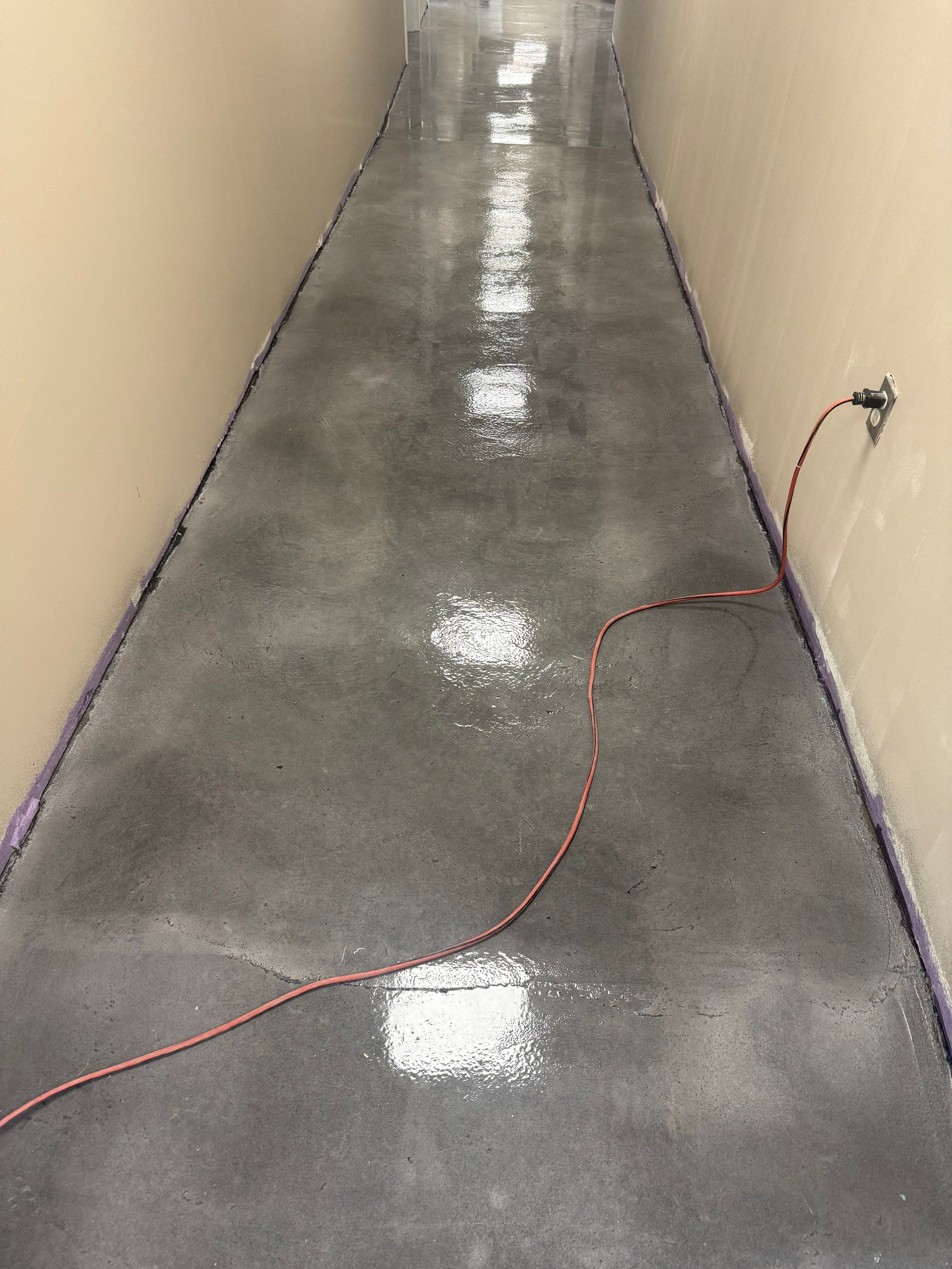 Industrial Epoxy Flake and Concrete Overlay Floor Installation in Pensacola by Cornerstone Hard Surface Restoration