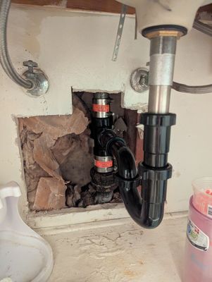 Bathroom sink drain line stoppage and leak