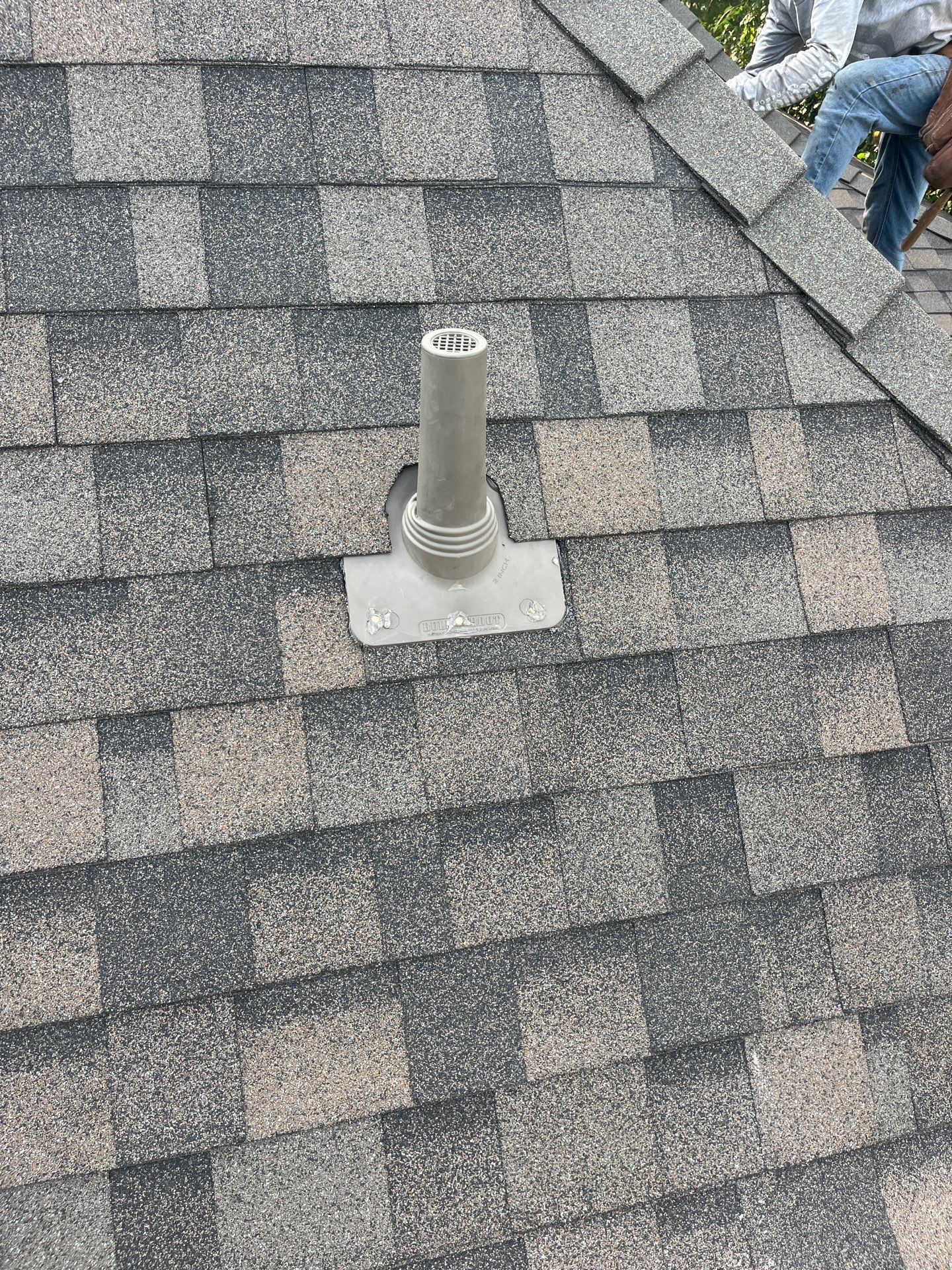 Tan exterior with IKO Driftshake by Tejas Roofworks + Restoration