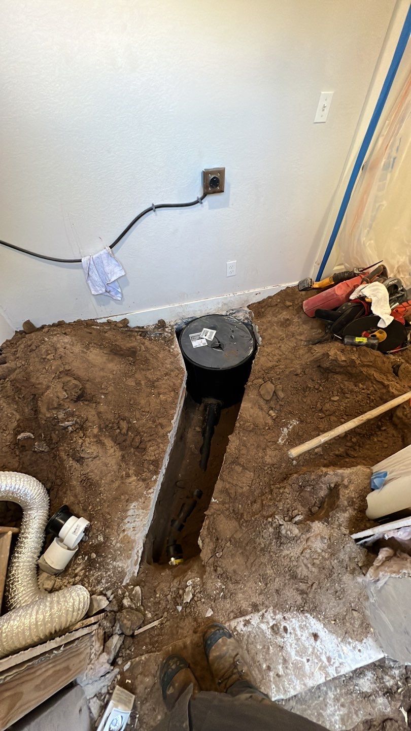 Basement Sump pump/pit by Plumbing Connect Systems LLC