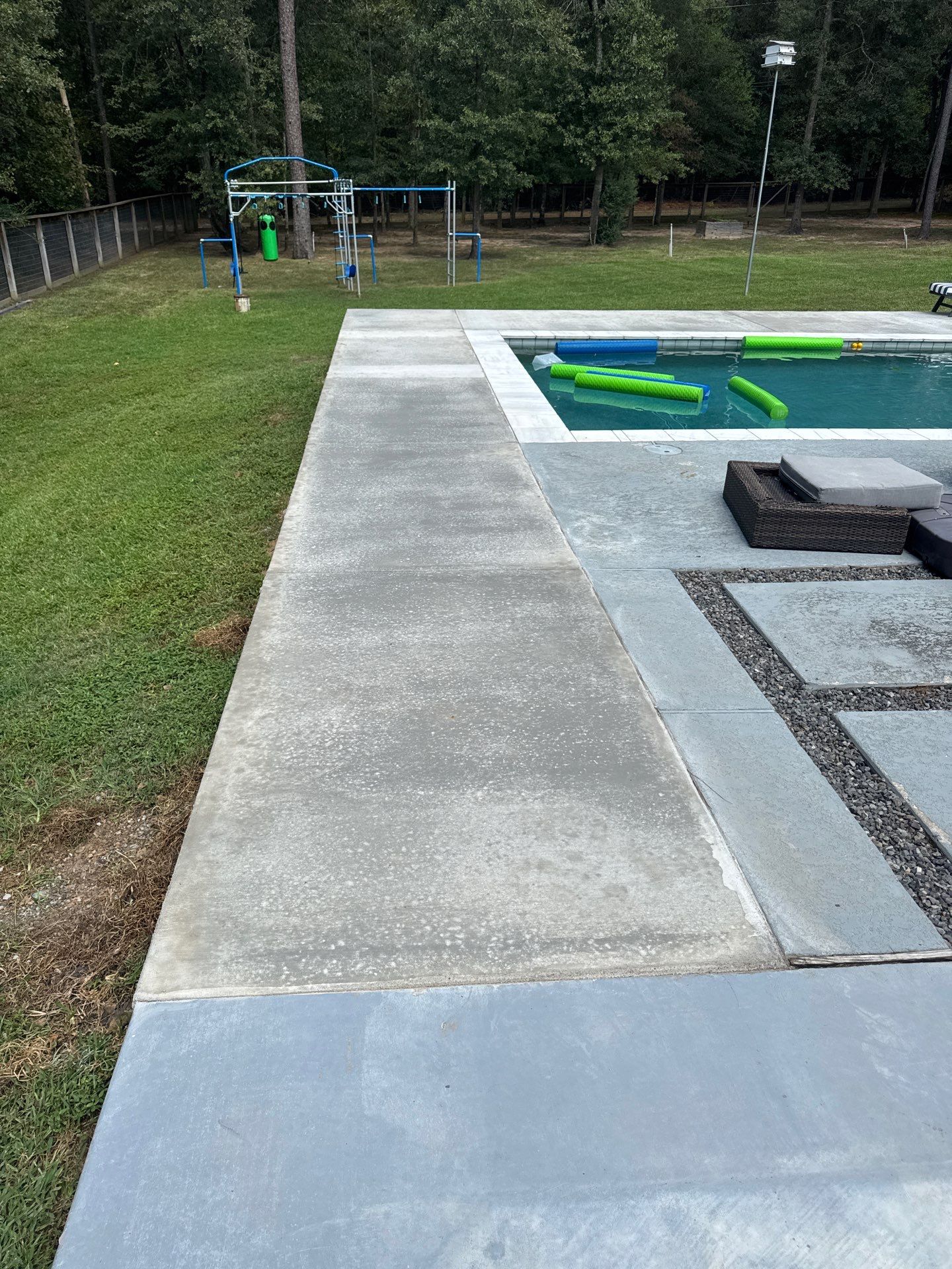 Huffman Roof Repair and Concrete Addition by Modern BYLT Roofing & Construction