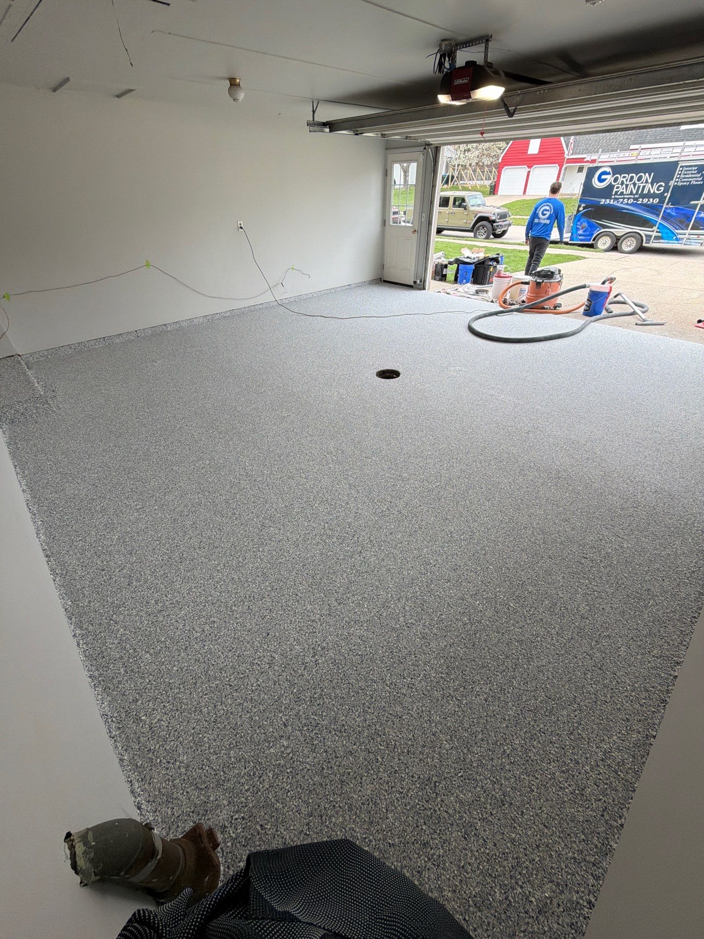 Muskegon Garage Interior Painting and Epoxy Flake Floor Installation by Gordon Painting