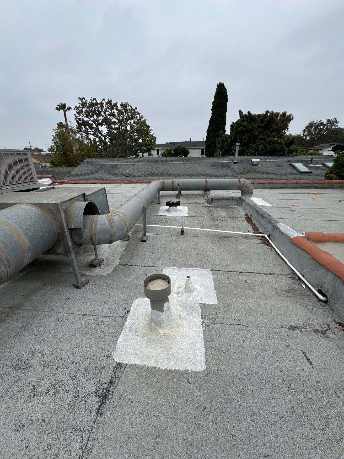 Tile Reset and Silicone Membrane Installation by Hull Brothers Roofing
