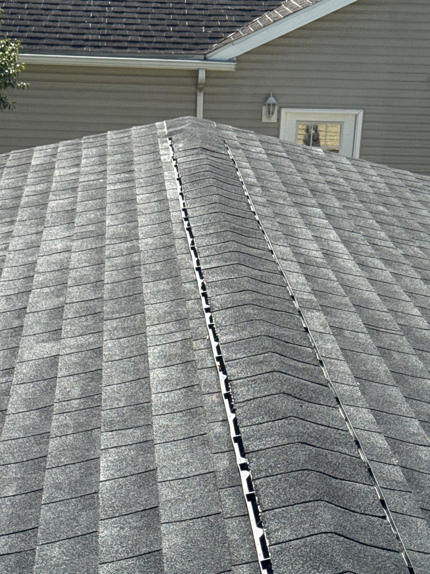 Residential Roofing Installation using GAF Timberline HDZ Charcoal by Rainstoppers Roofing