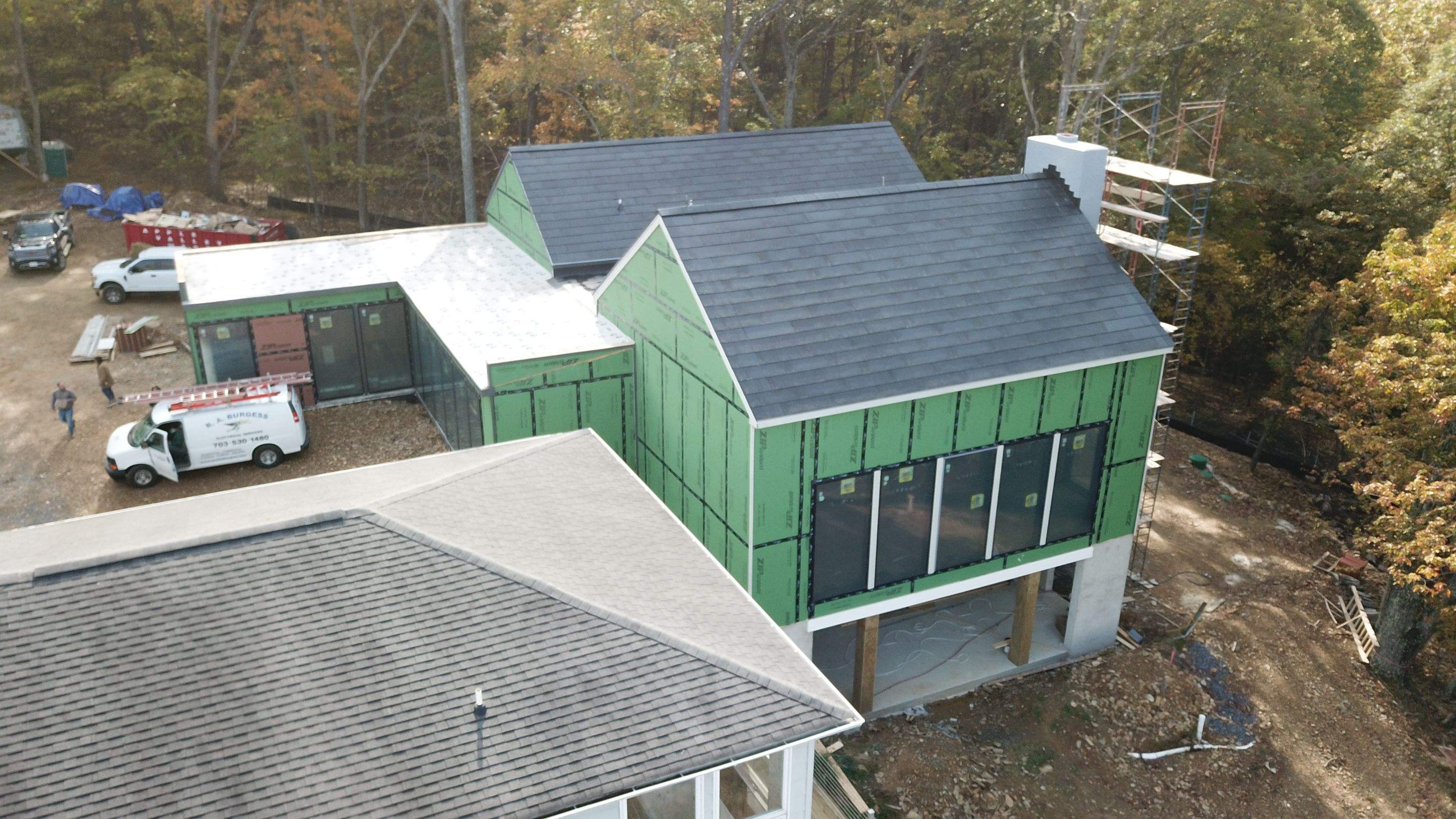 Roof Installation using Tesla Solar Roof V3 by American Home Contractors