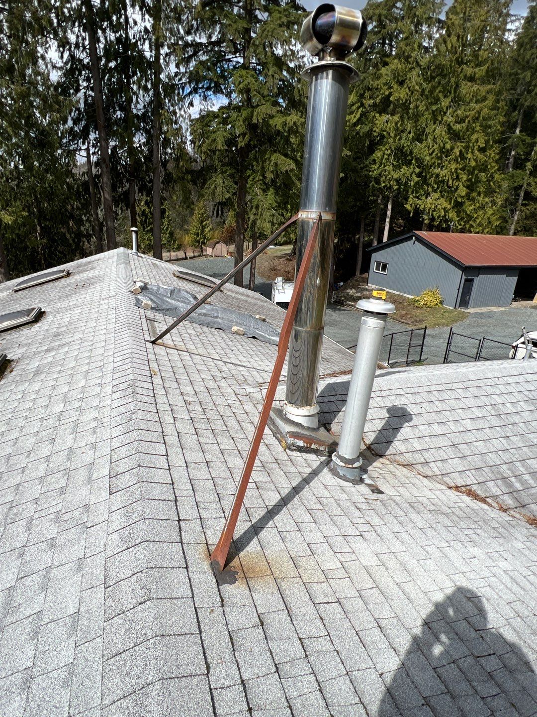 Residential ReRoofing Installation using 12" Prolok metal by Top Notch Roofing Inc
