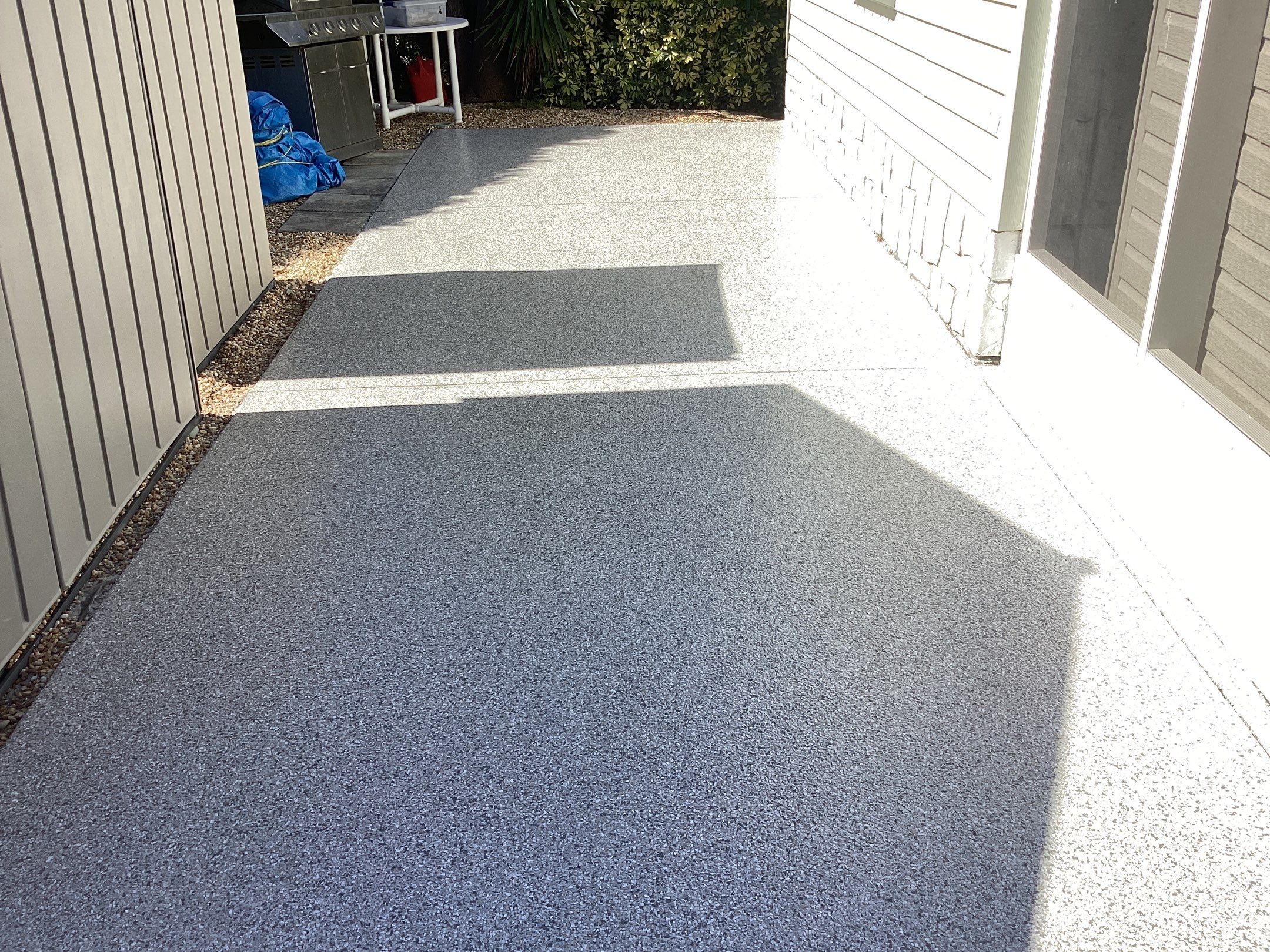 Driveway using Mt Everest by Amvet concrete coatings llc