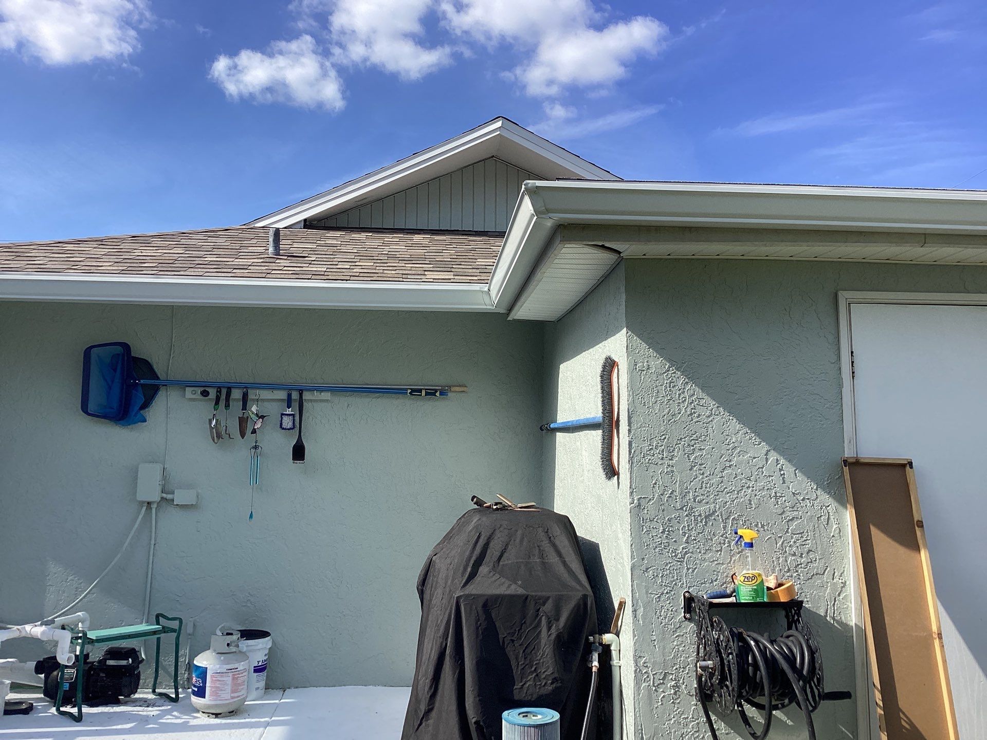 Downspout Installation using 3X4 Elbow Downspout in Cape Coral FL by Gutter Professors