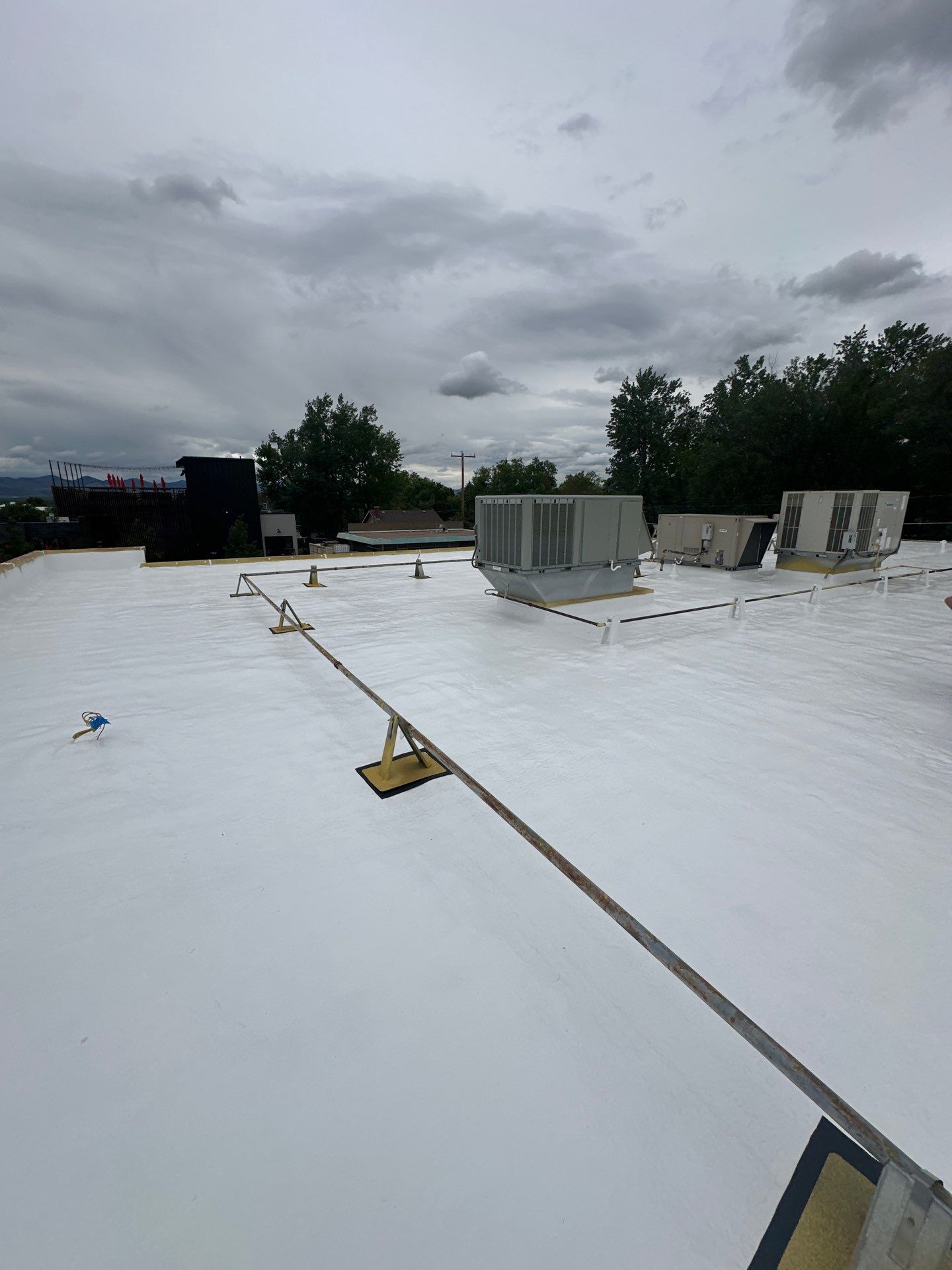 Complete Roof Coating System by Blue Peaks Roofing LLC