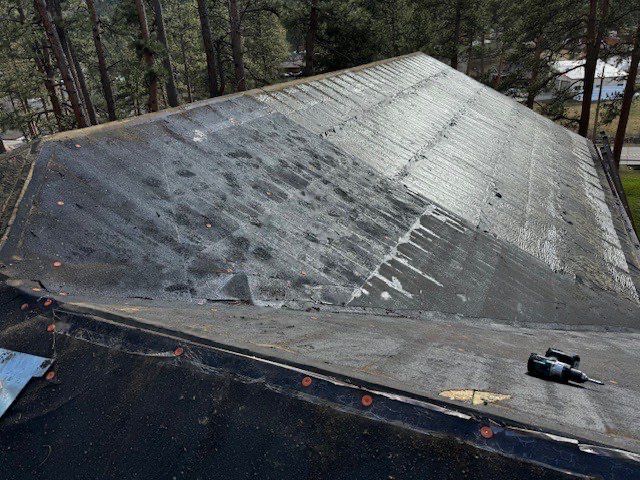 Residential Roofing Installation using Standing Seam Metal by Blue Peaks Roofing LLC 