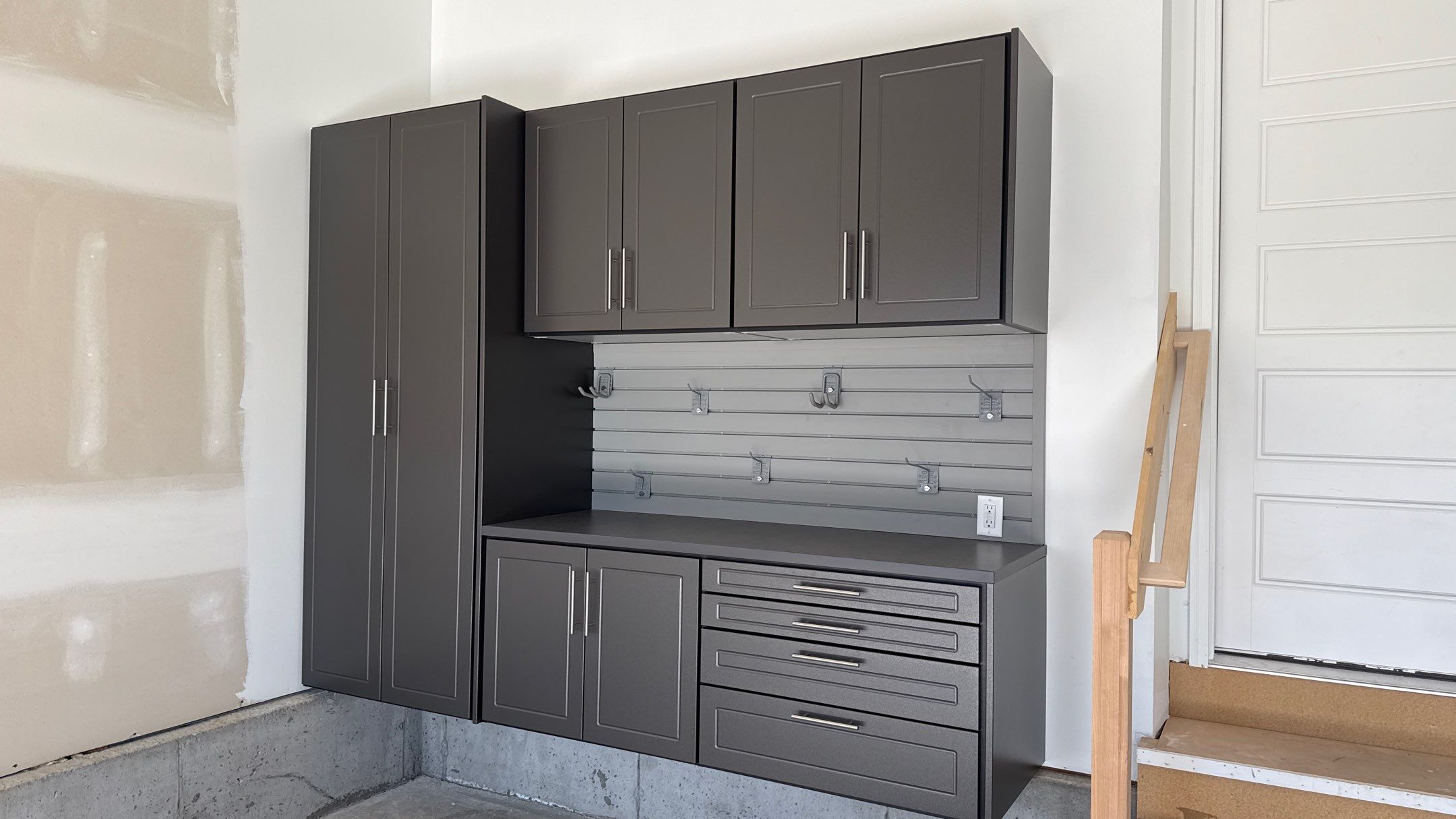 Nice Clean Look With These Pewter Cabinets by Banner Garage