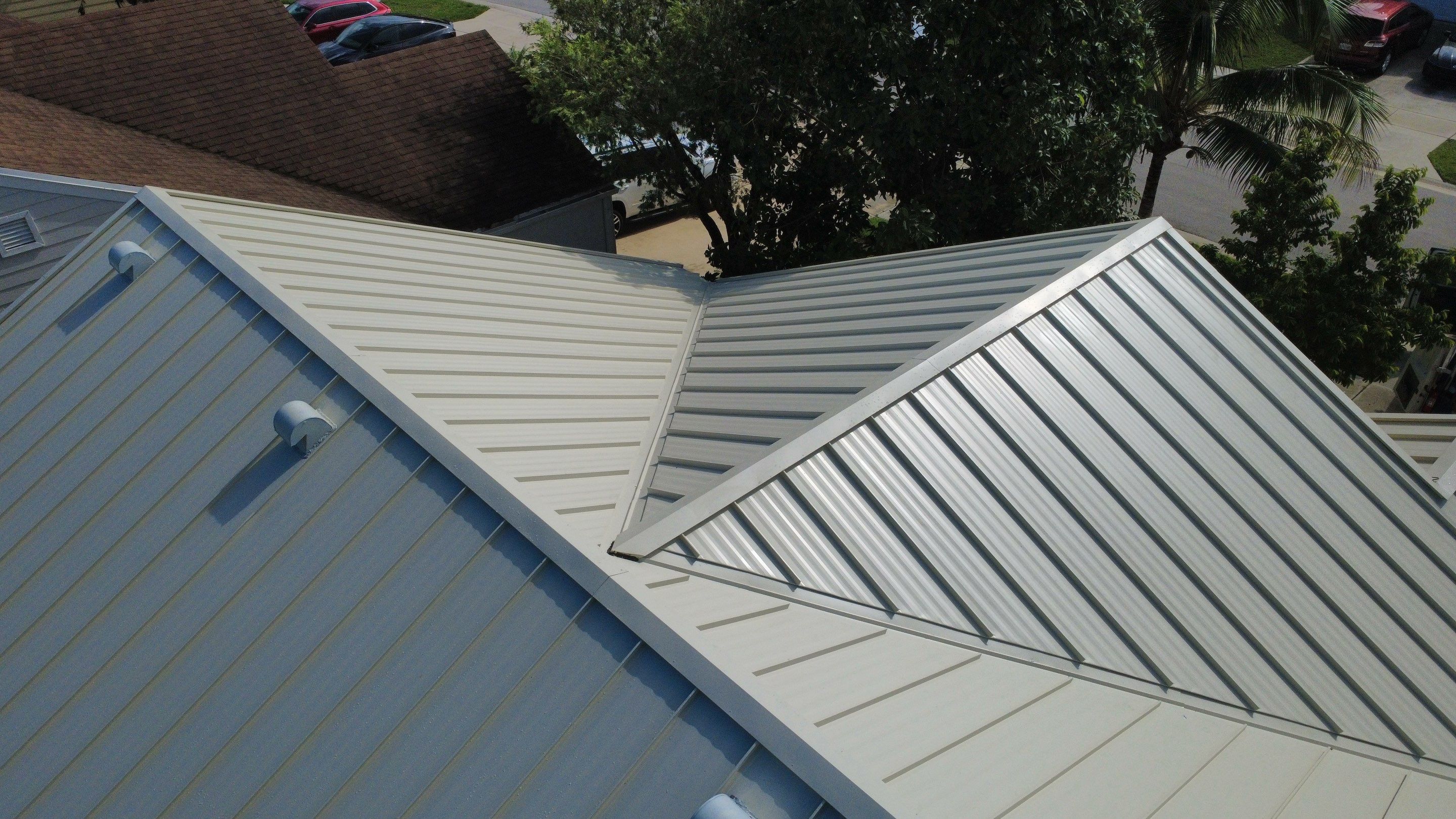 Residential Roofing Installation using 1.5'' Mechanical Seam by BLUES BROTHERS ROOFING