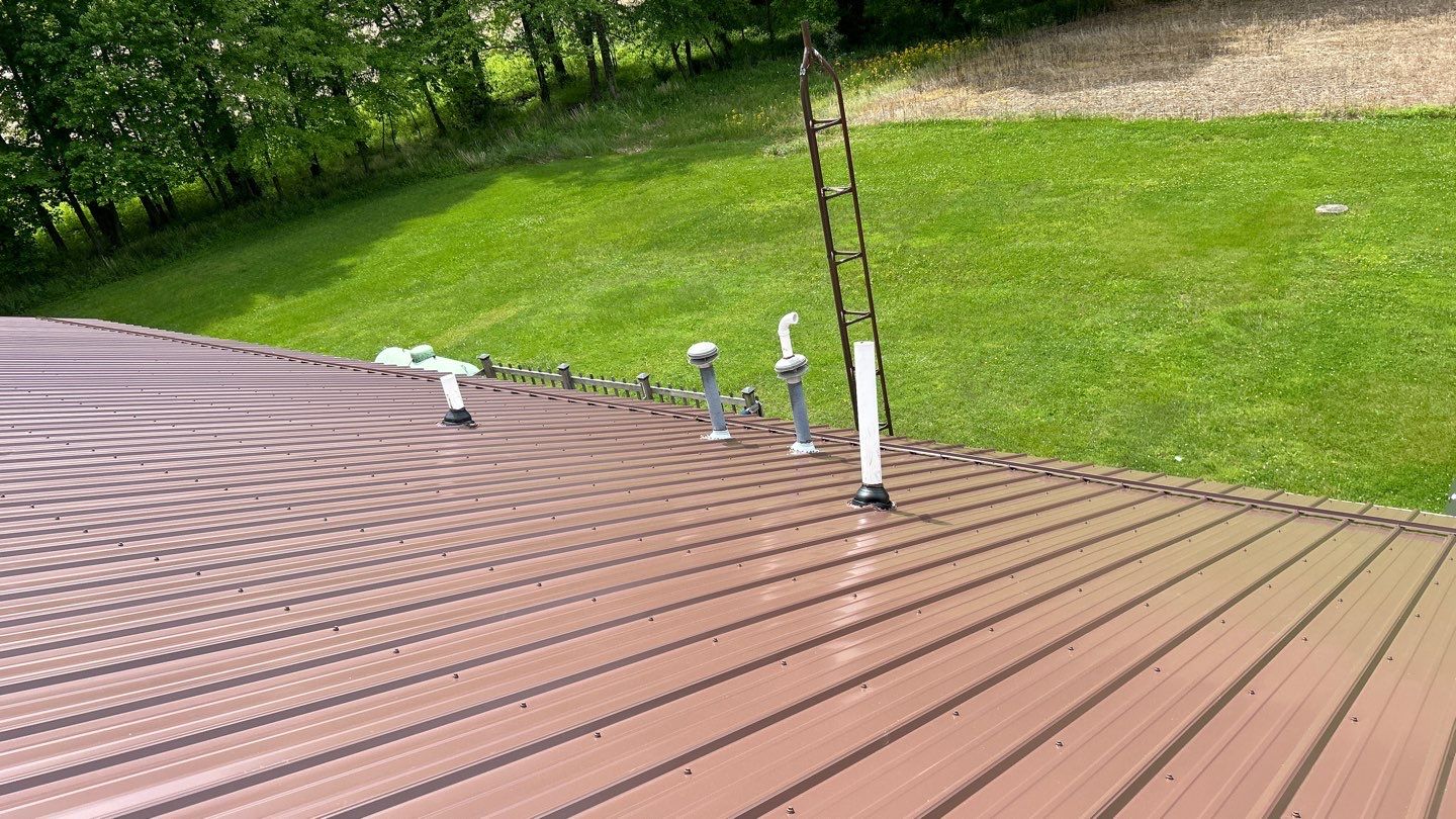 Residential Roofing Installation using Performance Panel Metal - Coca Brown by RoofX 