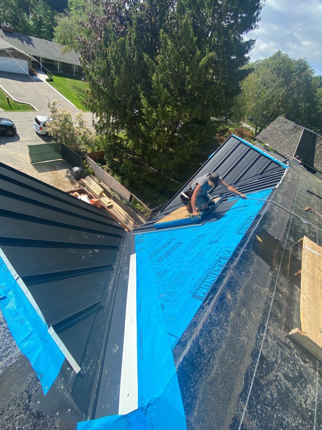 New Roof Installation using 16" Standing Seam Panels by Jay Carter Roofing & Sheet Metal