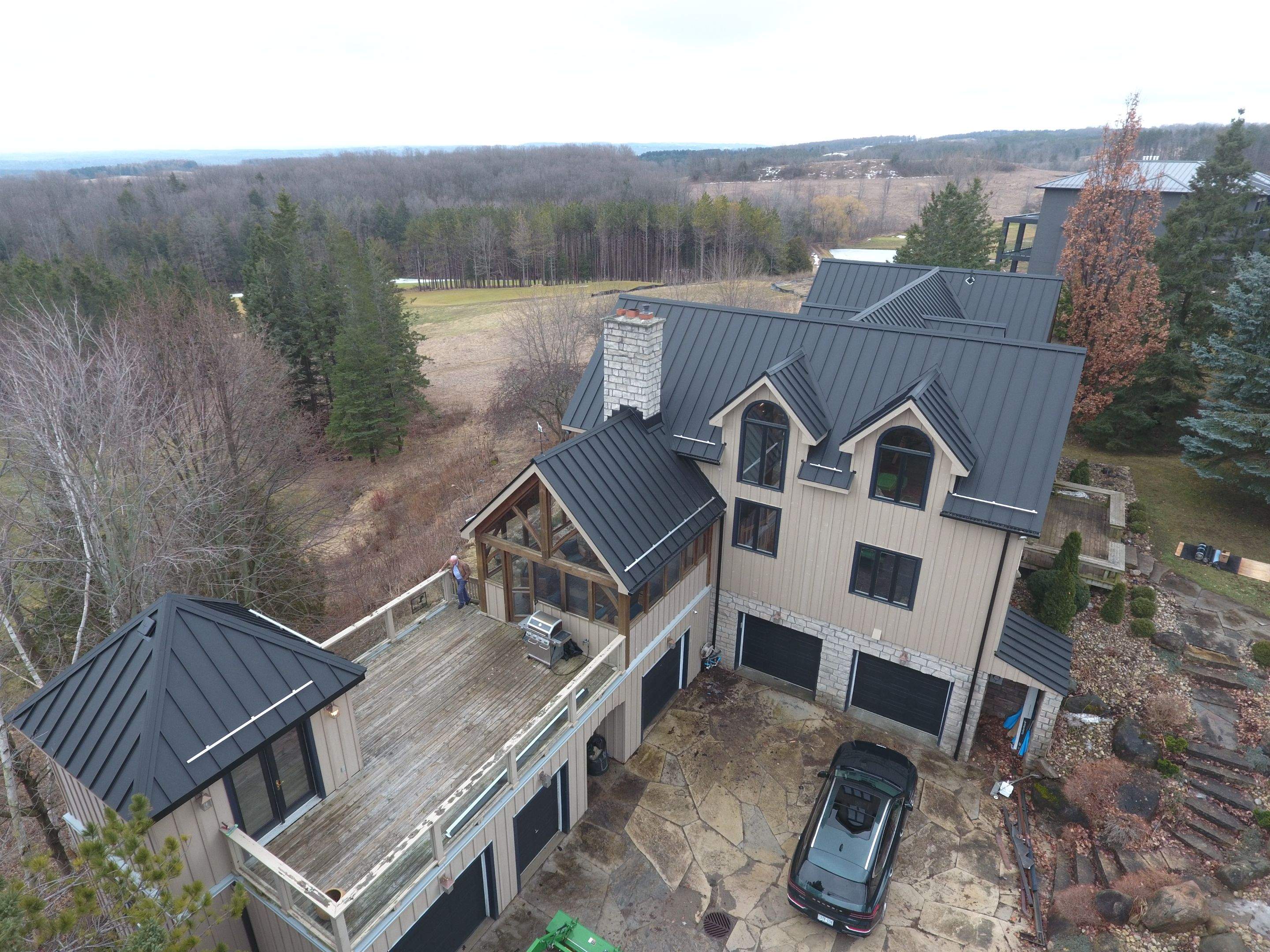 Residential Roofing Installation using 24 Ga Standing Seam Metal by Jay Carter Roofing & Sheet Metal