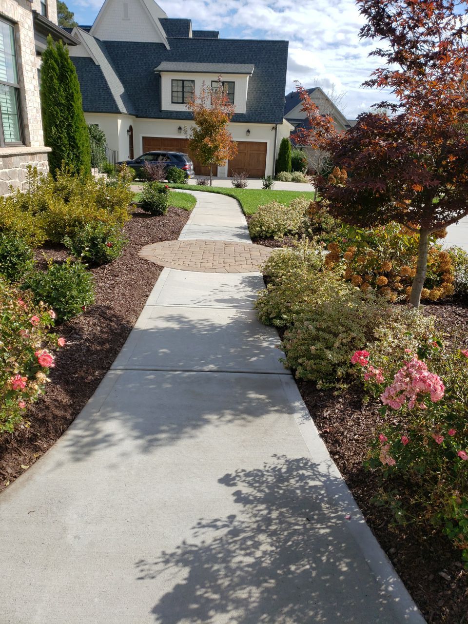 Driveway Clean using cleaner by Power Wash Masters LLC