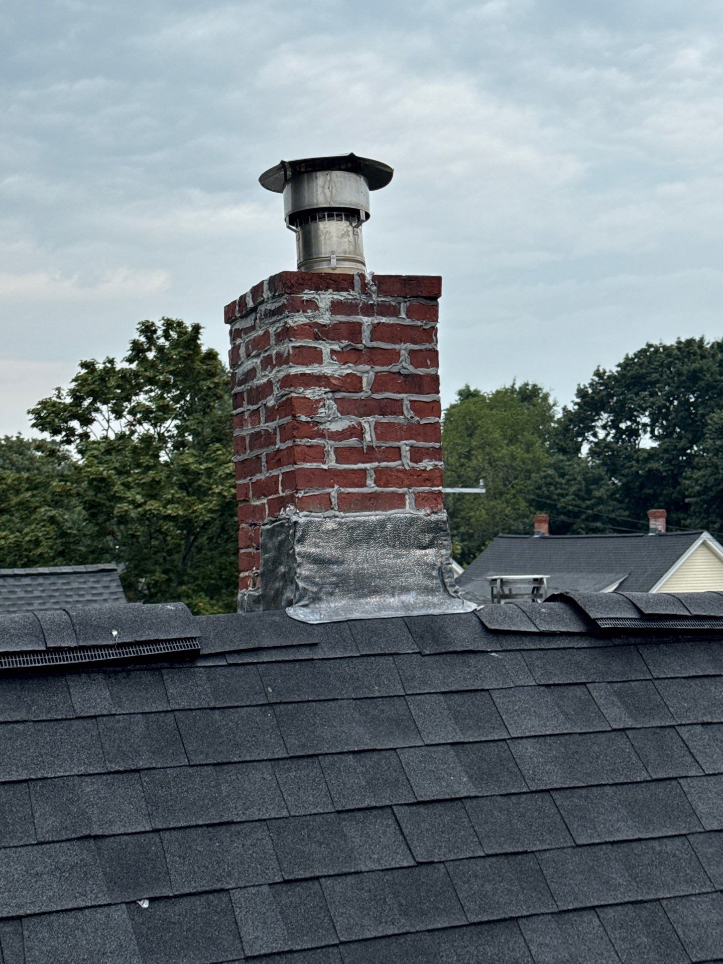 Full Roof Replacement + Custom Gutter Install | Onyx Black Finish by Mighty Dog Roofing of Greater Middlesex County