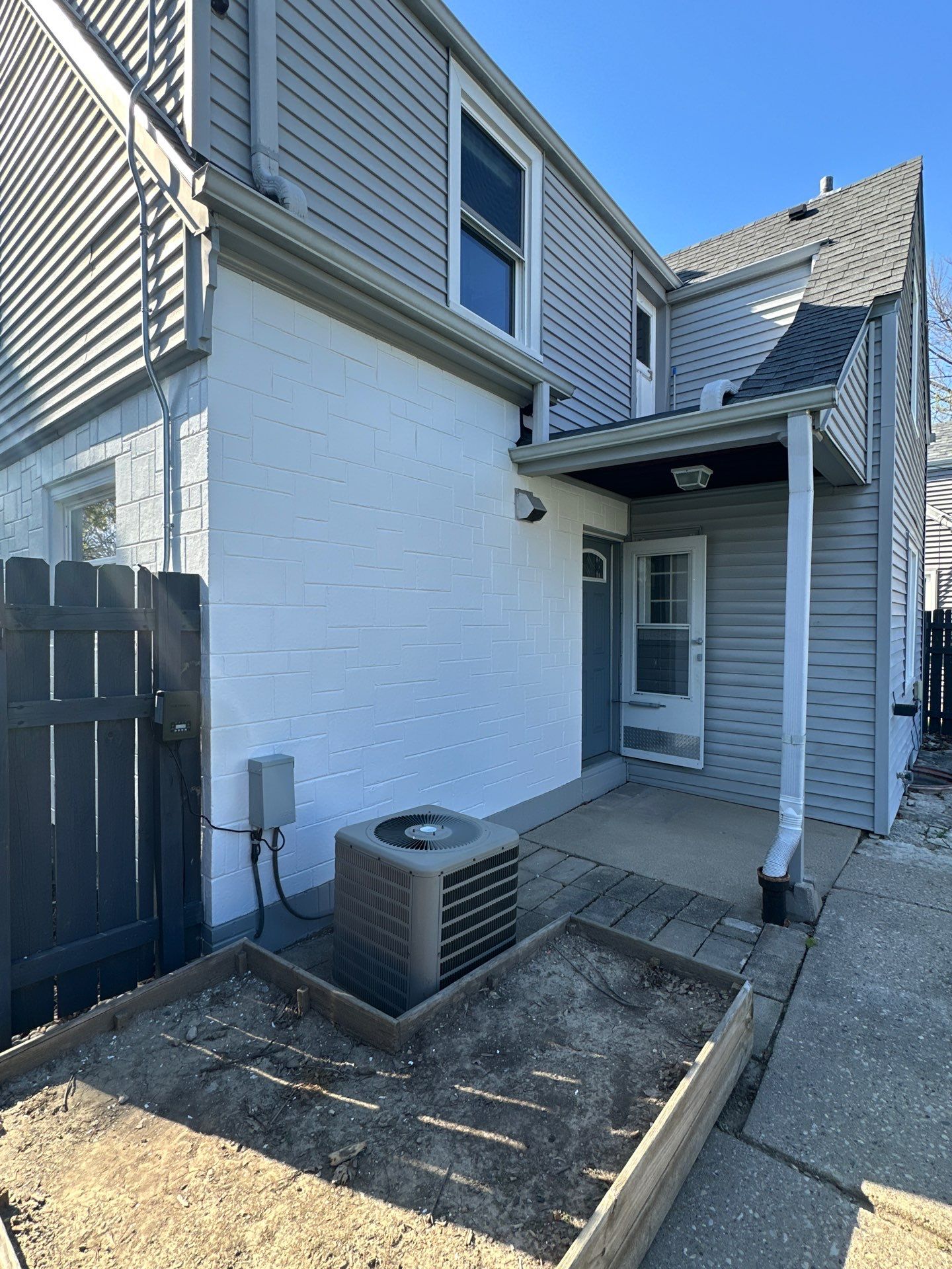 Milwaukee Cape Cod Exterior Renovation and Siding Replacement by OCS Contracting Services