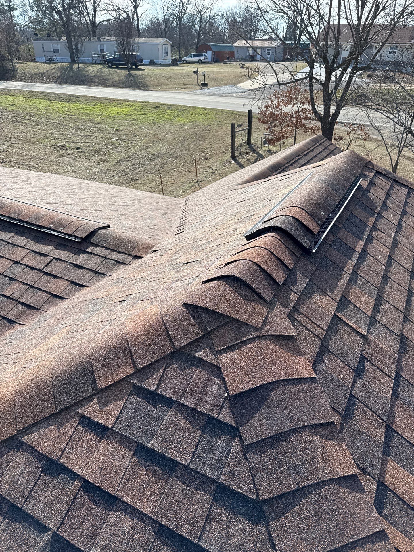Rustic Hickory Shingles & SBS Cap & Base by In & Out Construction & Remodeling, LLC