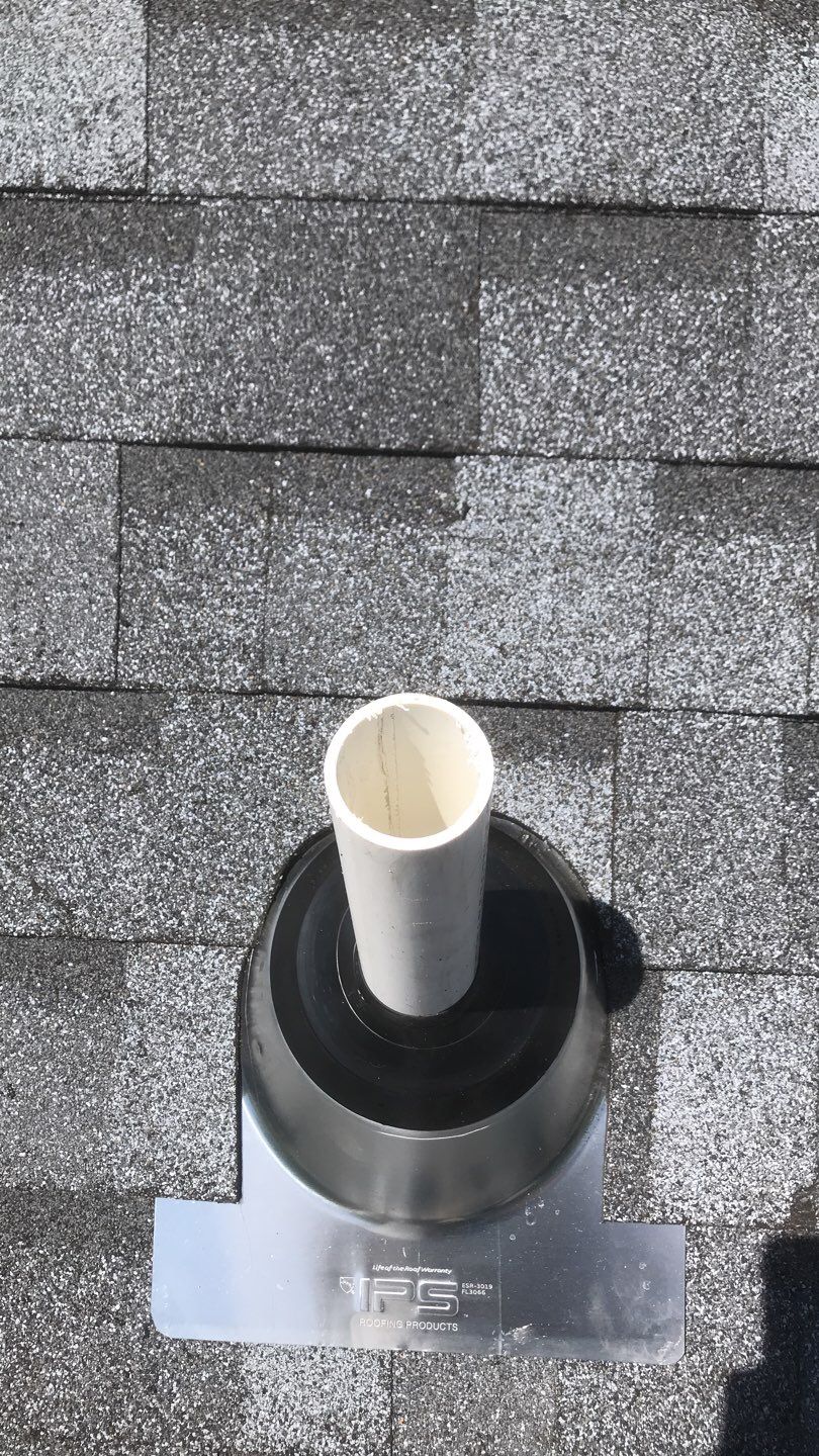 Commercial Roofing Installation using EPDM with white gutters by A Plus Exterior