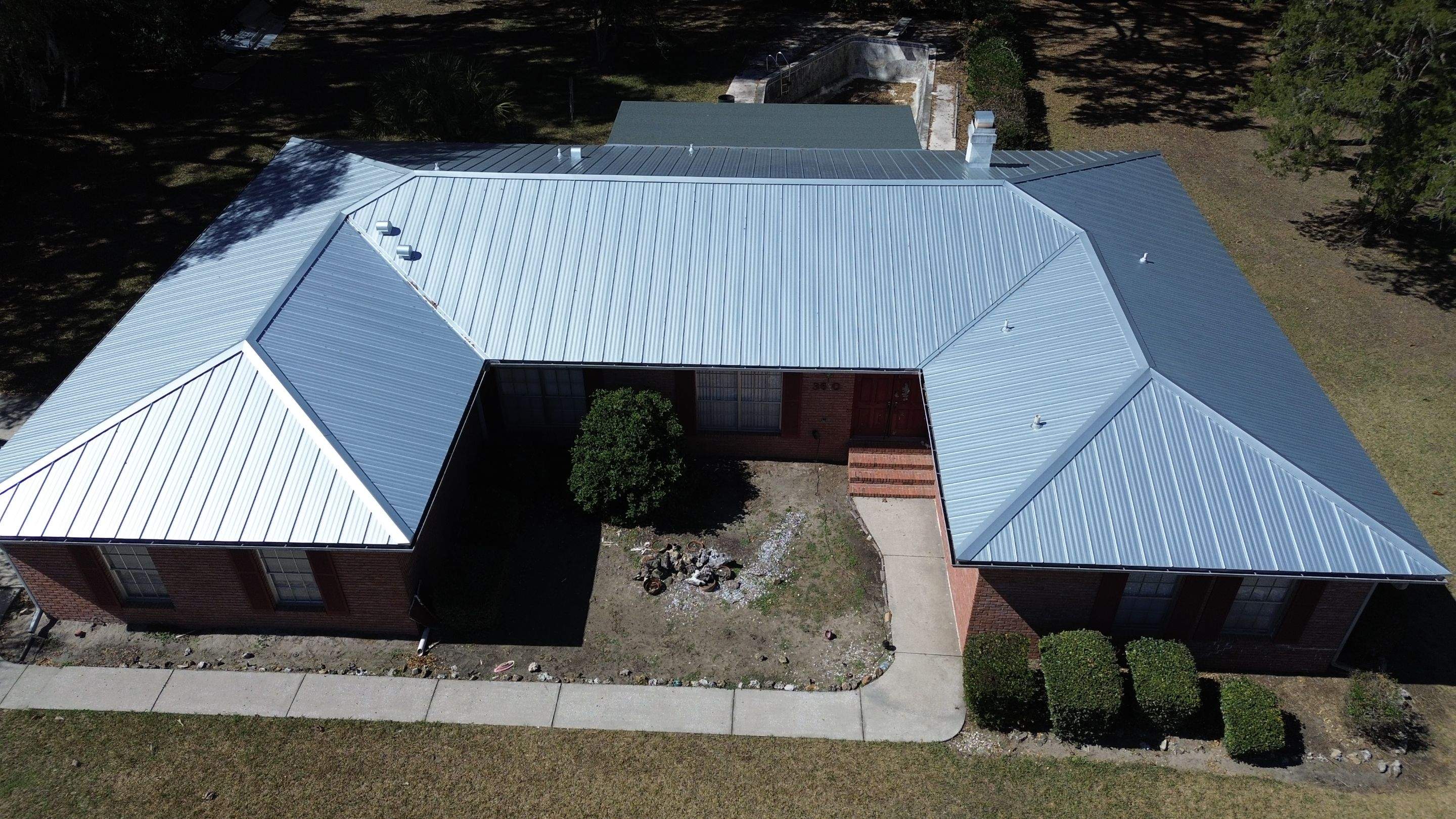 Metal reroof in Gainesville, FL by Brehm Roofing