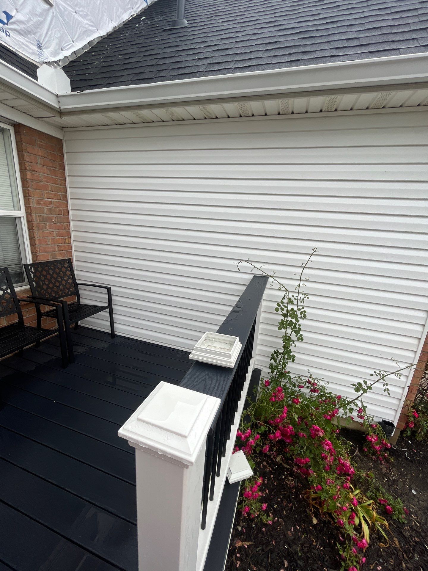Exterior Installation using Onyx Black Durations and White Siding by WIW Enterprises Inc