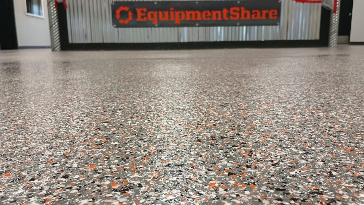 Equipment Share Commercial Floor Transformation using Smoke w/ 5% Orange by Croc Coatings, LLC