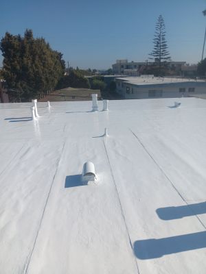 Commercial Roofing Installation using Silicone Coating