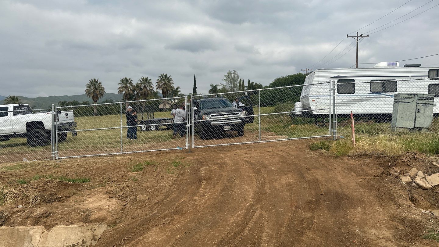 Fence installation using chain link wire by Fence Guys Inc. 