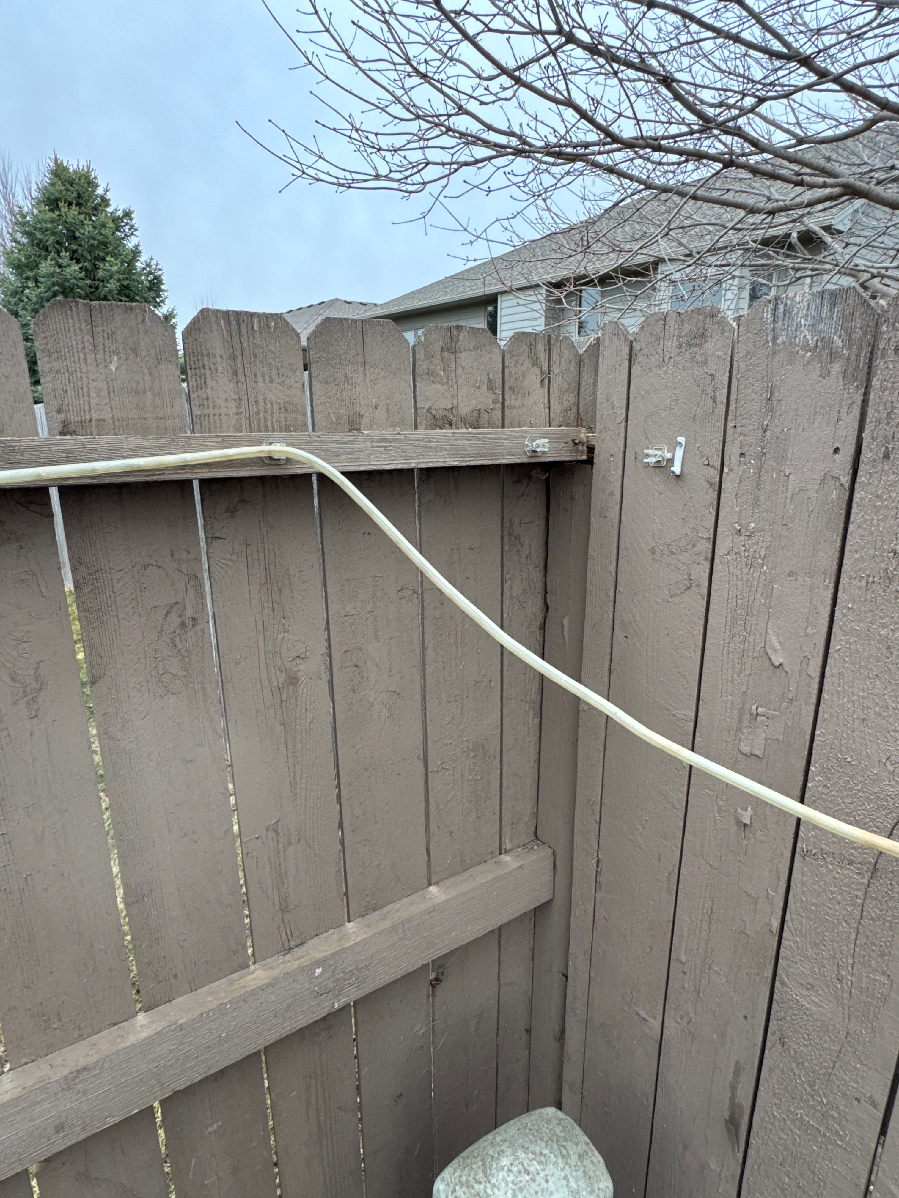 Sioux Falls Residential Exterior Update and Flagstone Pool Deck by Select Painting, Coatings & Garage Cabinets