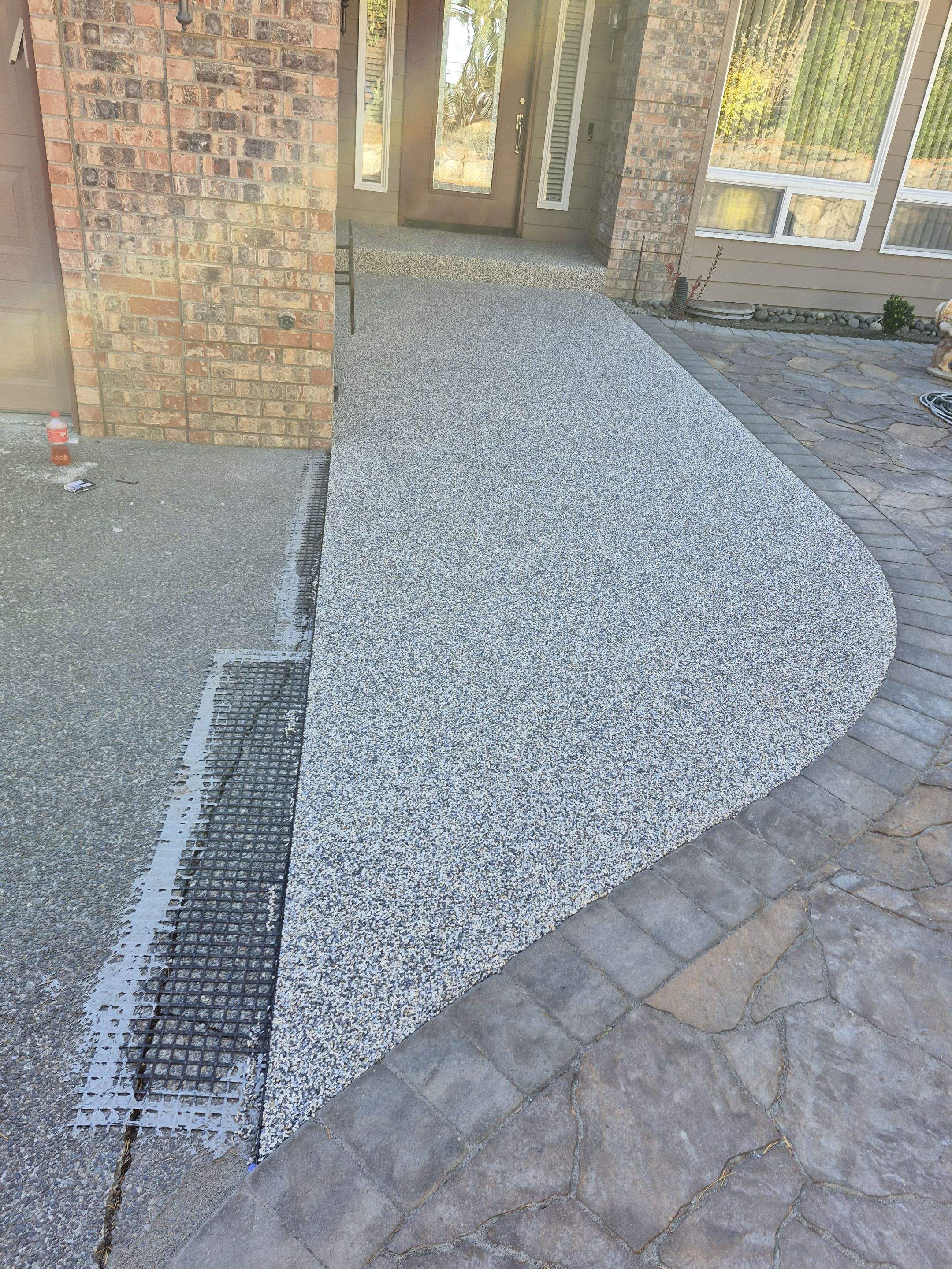 Stylish Walkway and Patio in Tennessee Vuba Stone by Concrete Coating Experts Inc.
