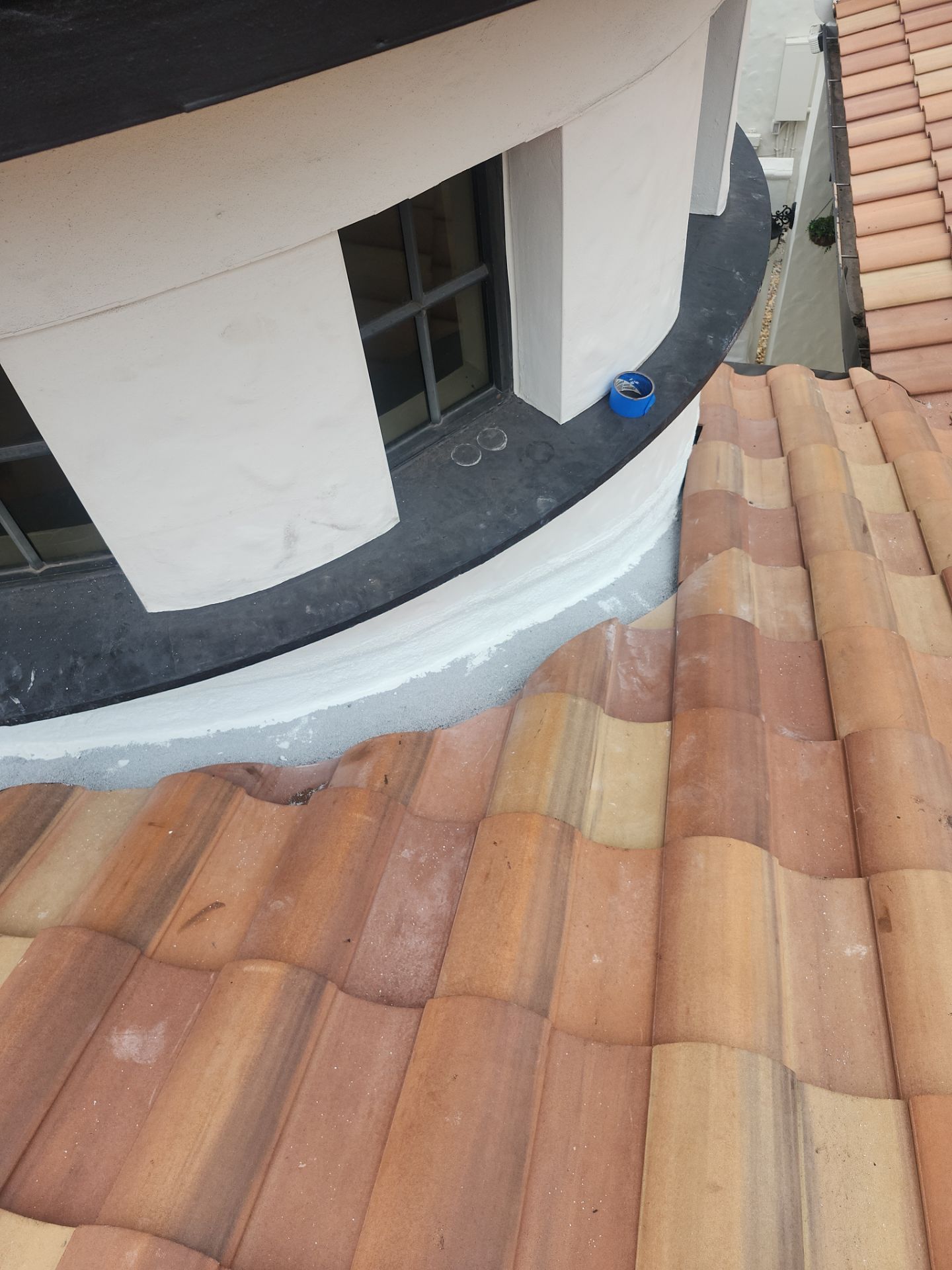 Tile Roof and Roof-to-Wall Repairs in Parkland by Aastro Roofing