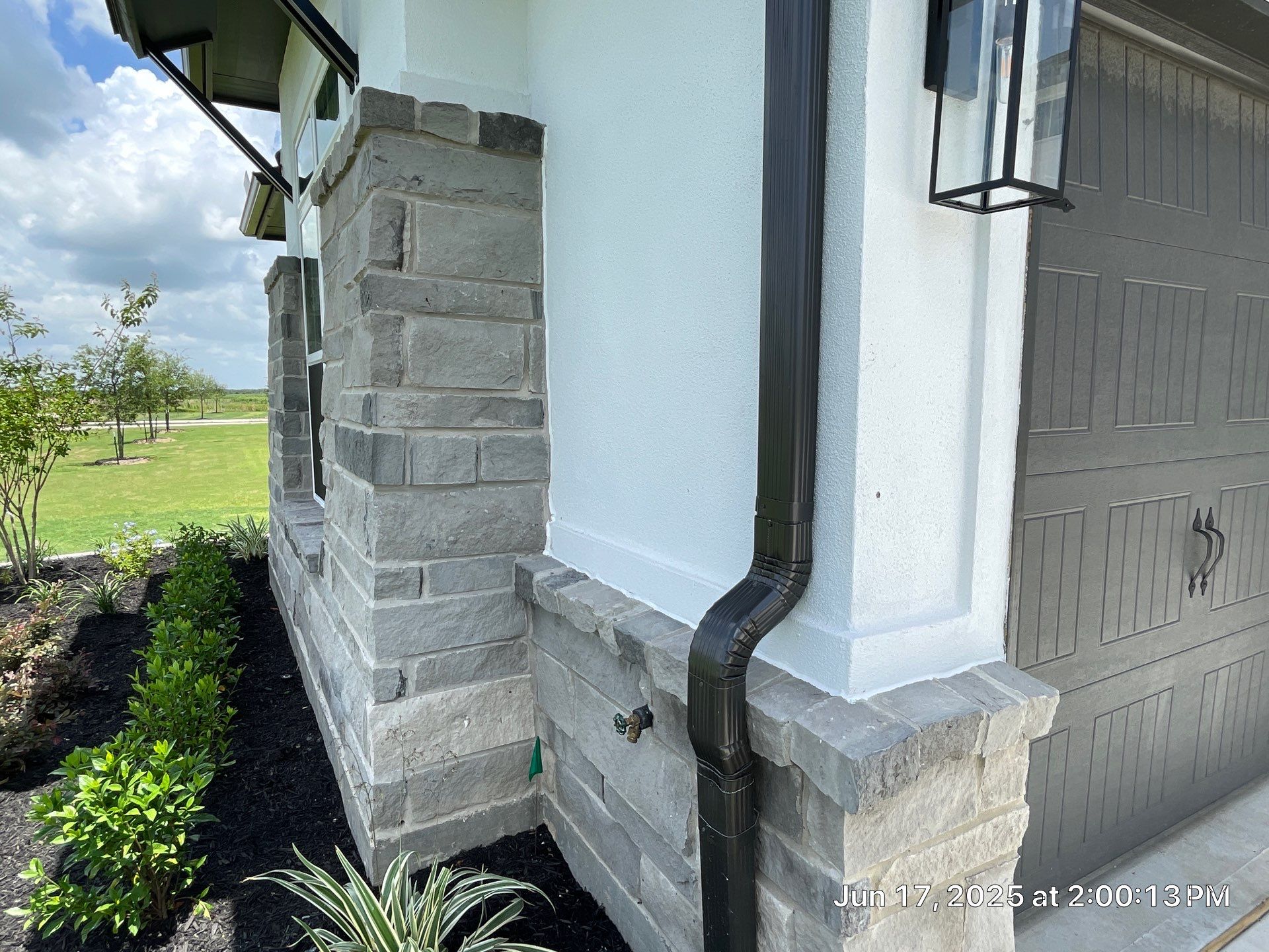 Waller Sophistication: Snowbound Color Stucco with Limestone Accents. by Apex Conventional Stucco Llc