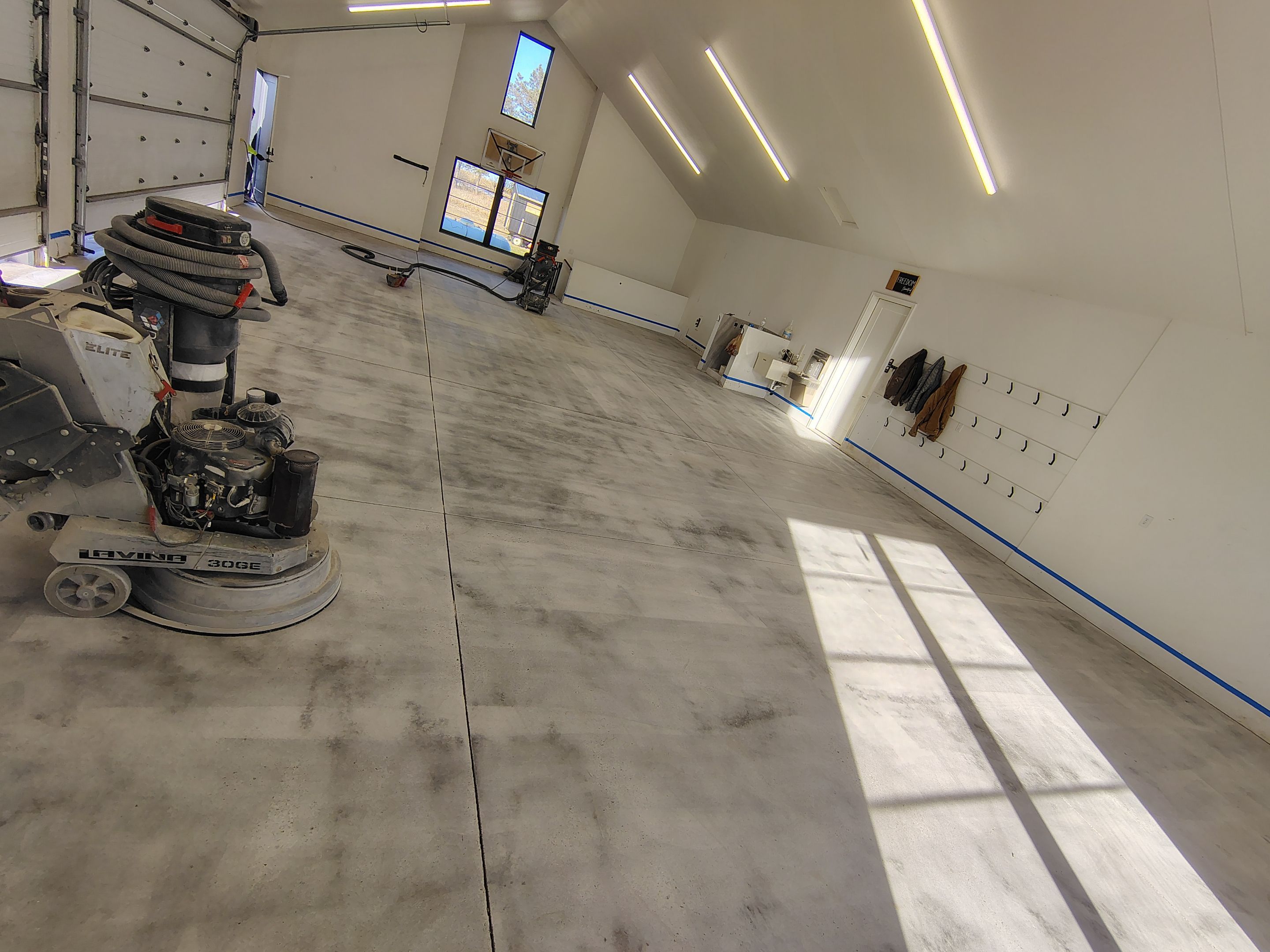 Epoxy Flake Garage Floor and Stair Coating in Sioux Falls by Select Painting, Coatings & Garage Cabinets