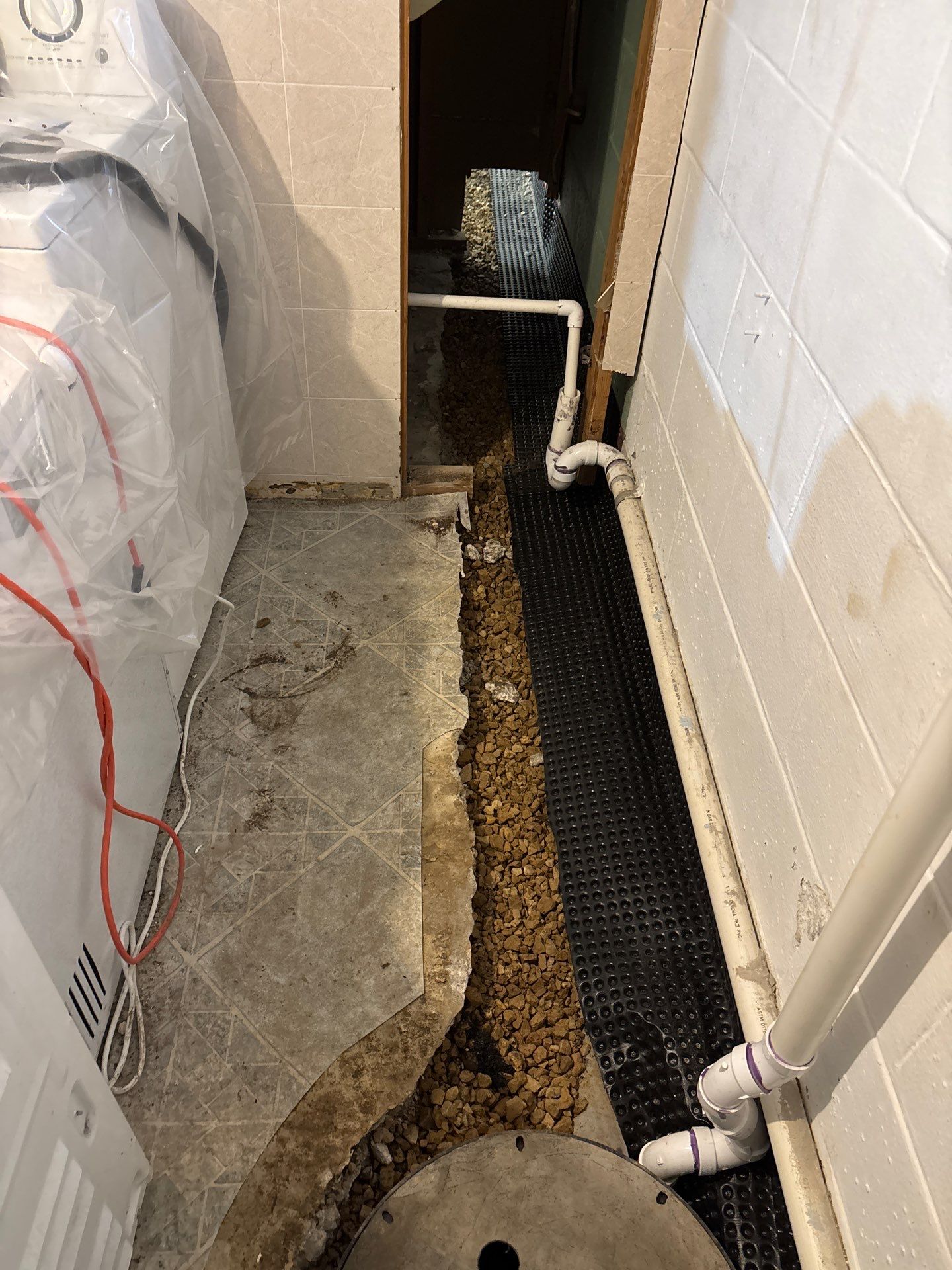 Drain Tile & a Sump Pump for our Property Management Partner by Waterproofing Northeast