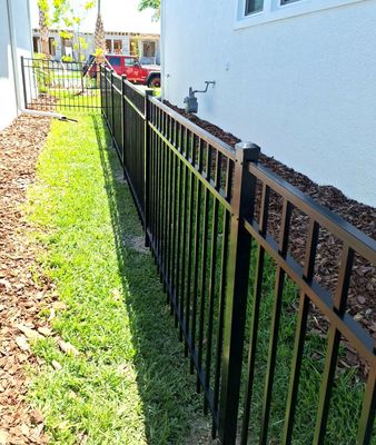 Aluminum Fence Installation using Black 3 Rail Aluminum Fence