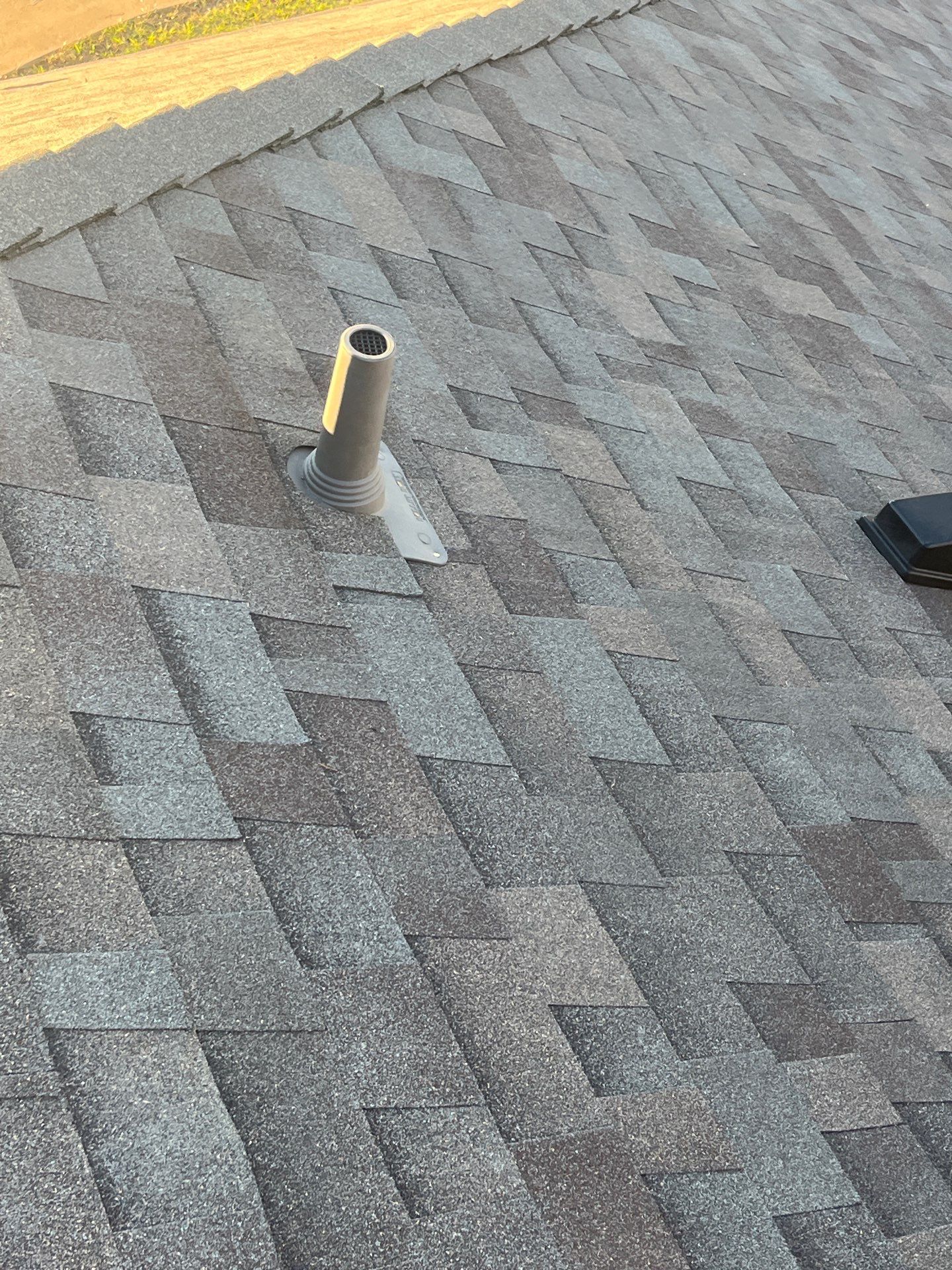 Brick with Malarkey Natural Wood by Tejas Roofworks + Restoration