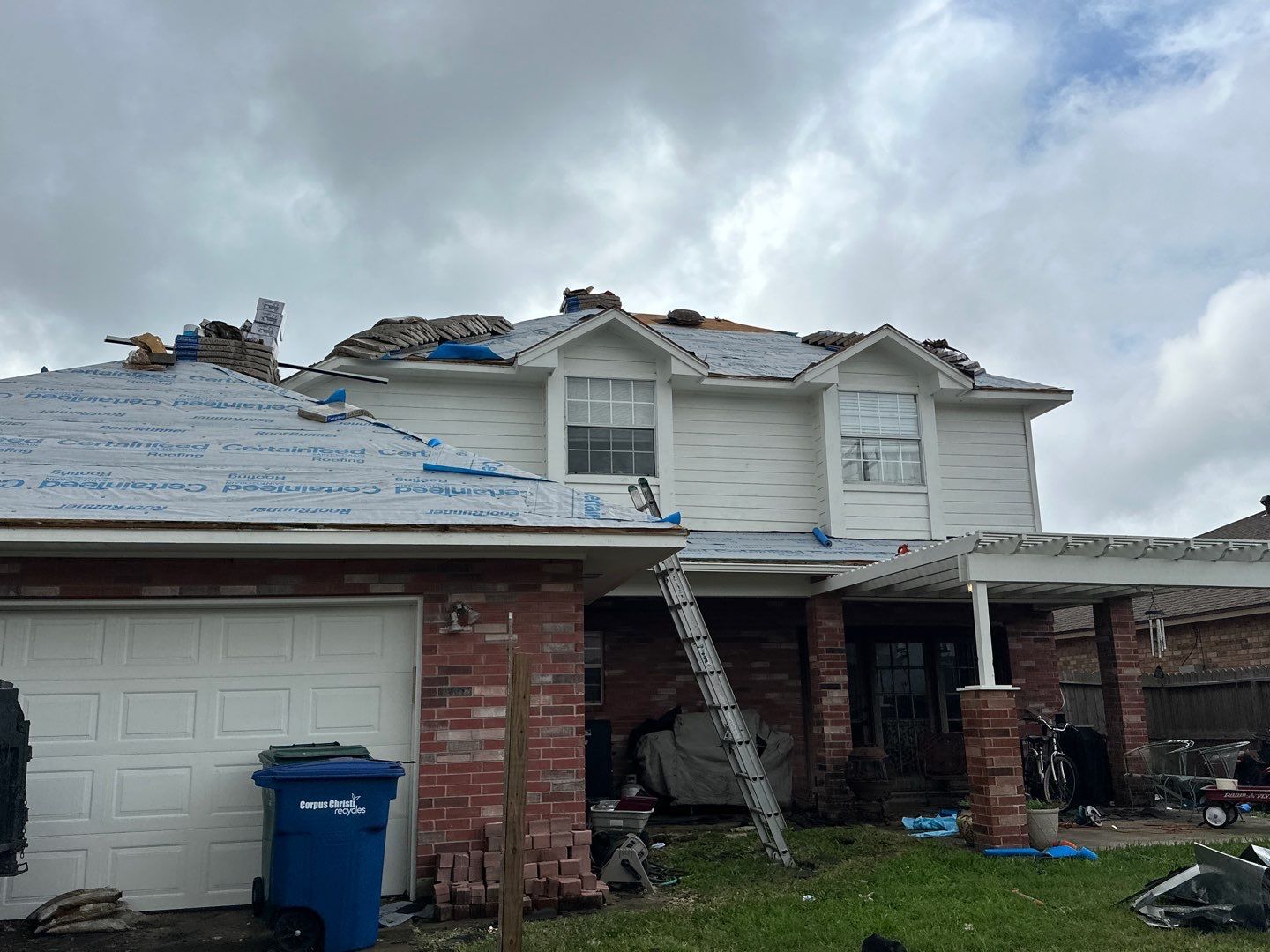 Residential Roofing Installation using Certainteed Landmark Moire Black by Galvan Roofing and Construction