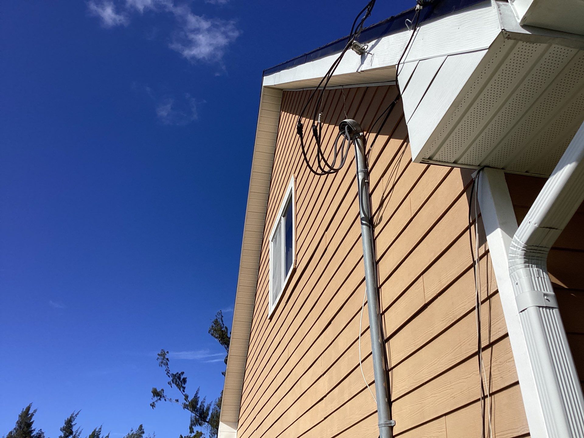 Soffit & Fascia White + New Downspouts by Gutter Professors