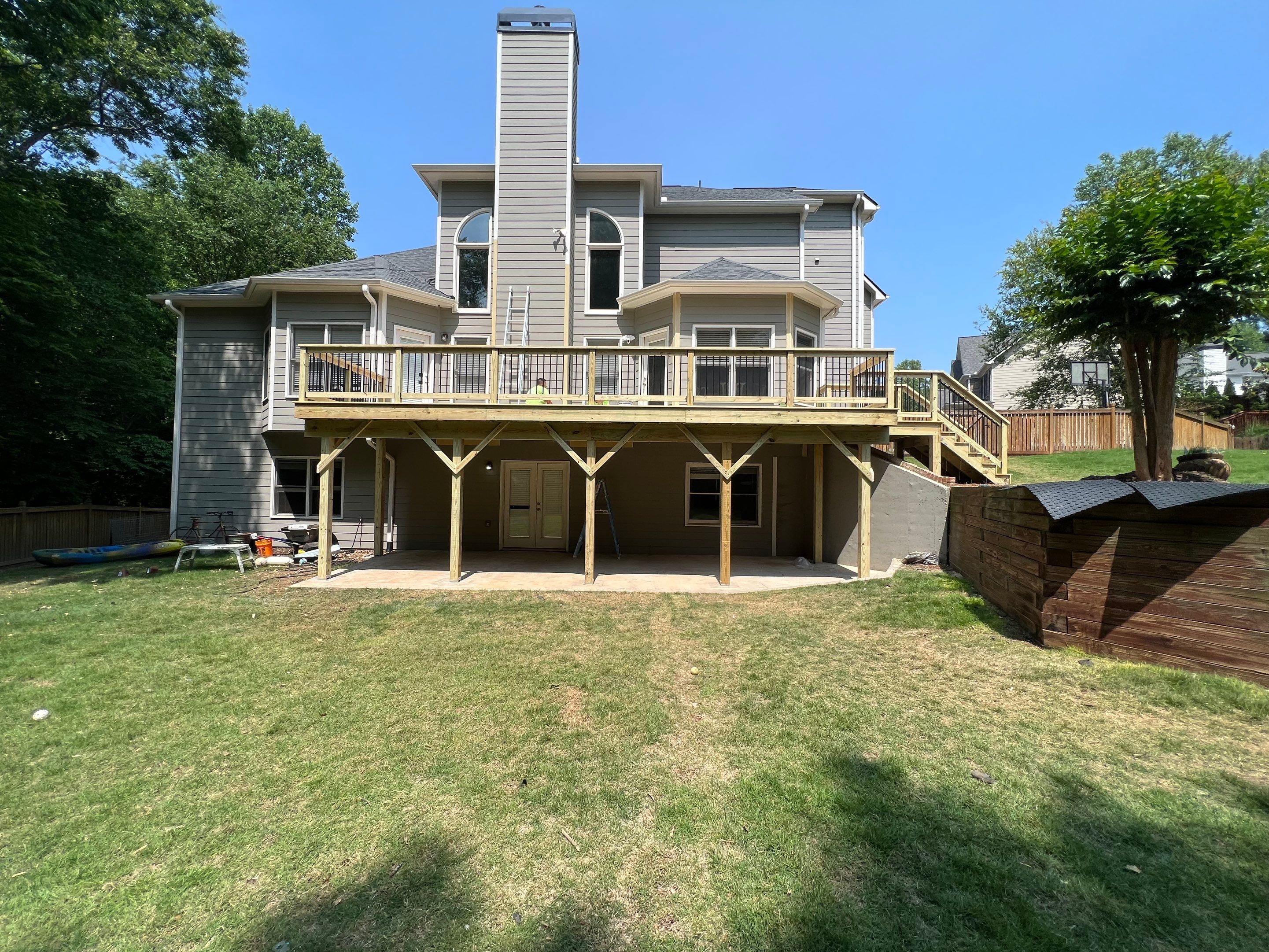 Elevated Wood Deck Replacement and Staircase Installation in Woodstock by Swift Home Renovations