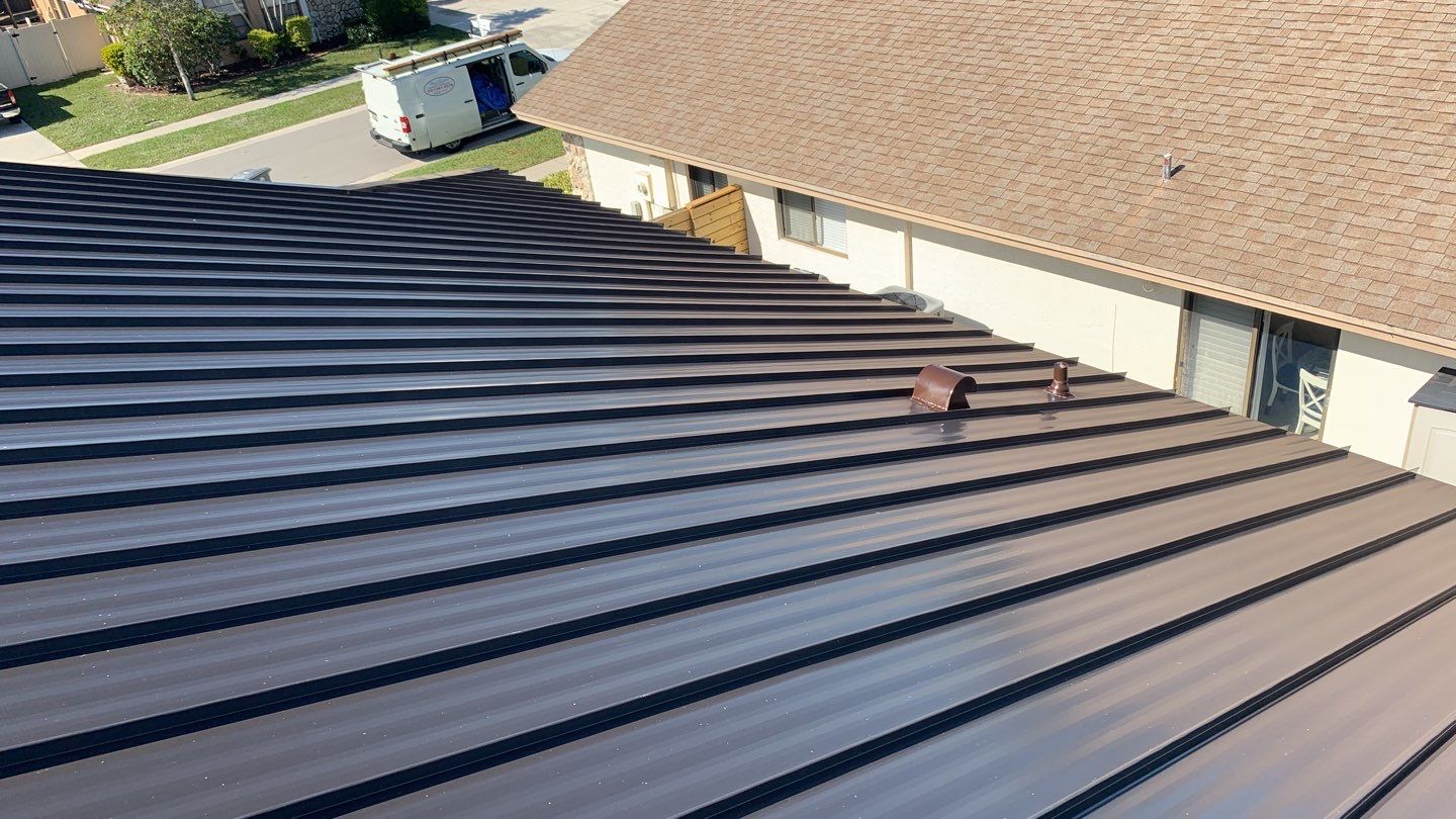 Residential Roofing Installation using 1" Nail strip metal roof by BLUES BROTHERS ROOFING