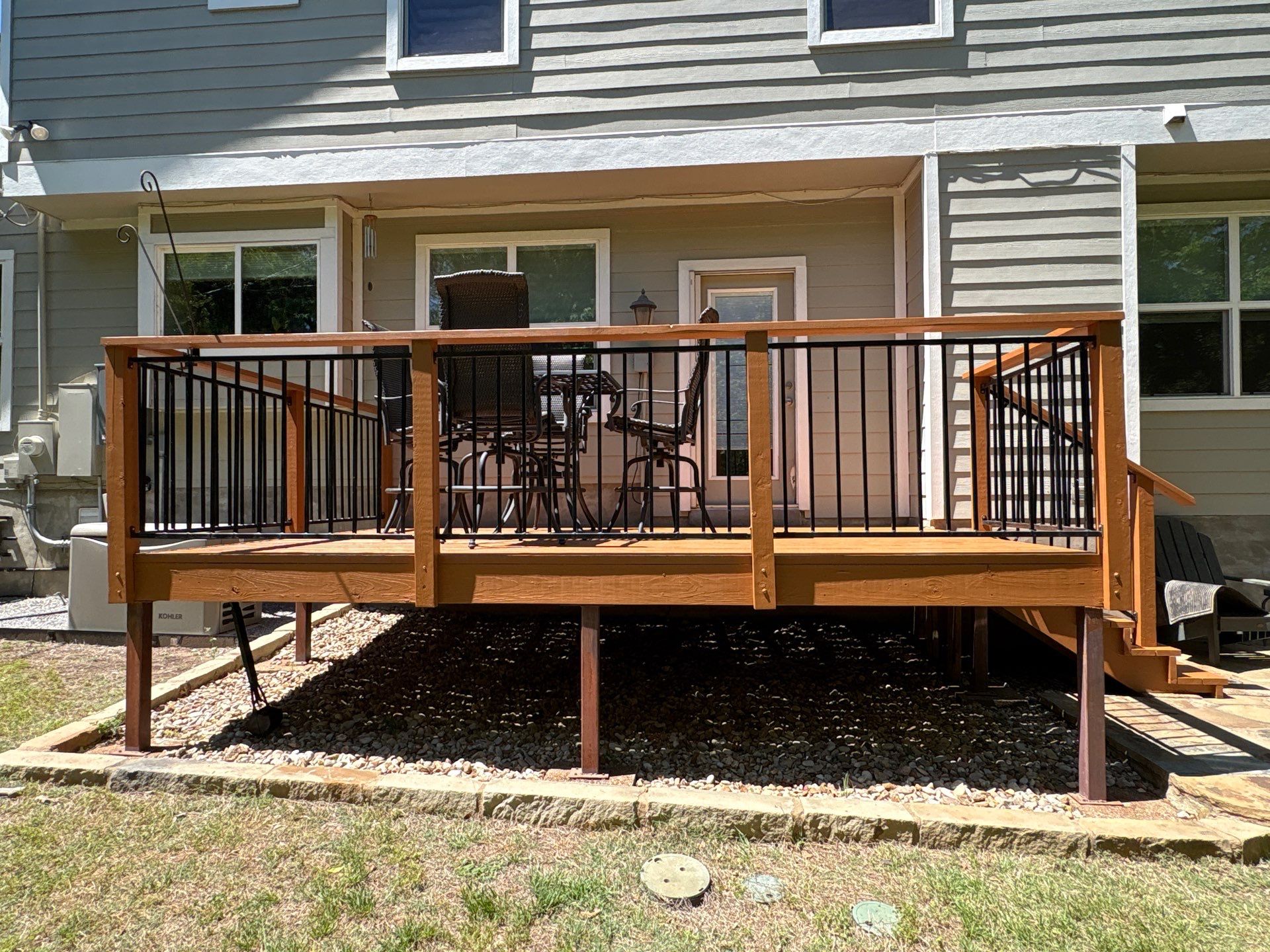 Back Deck Repainting Project in Austin, TX by Kstylez Roofing & Construction