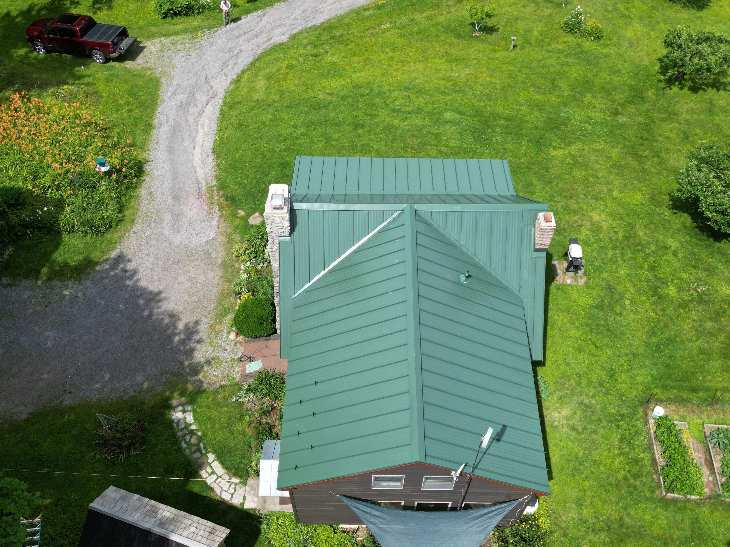 Residential Roofing Installation using Standing Seam  by Goldspire